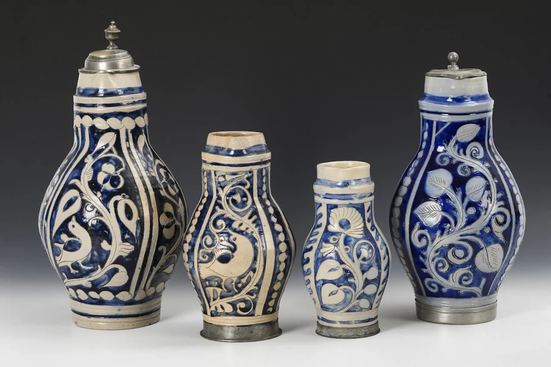 4 pear-shaped jugs. Westerwald.