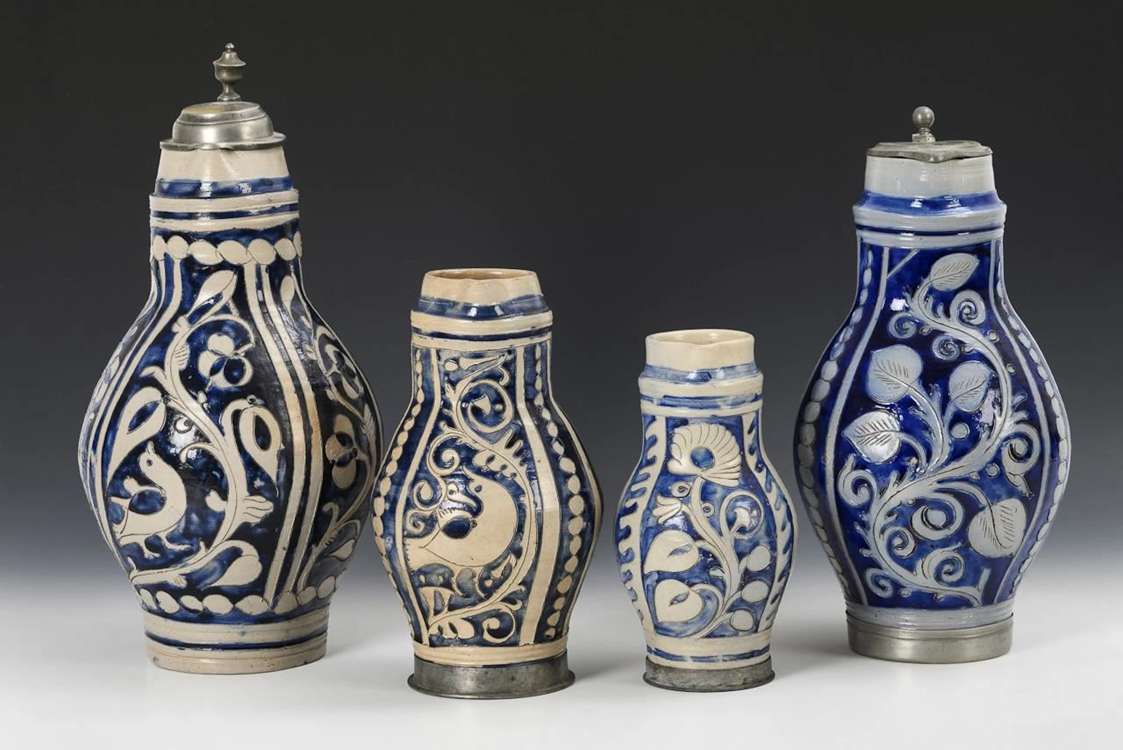 4 pear-shaped jugs. Westerwald.