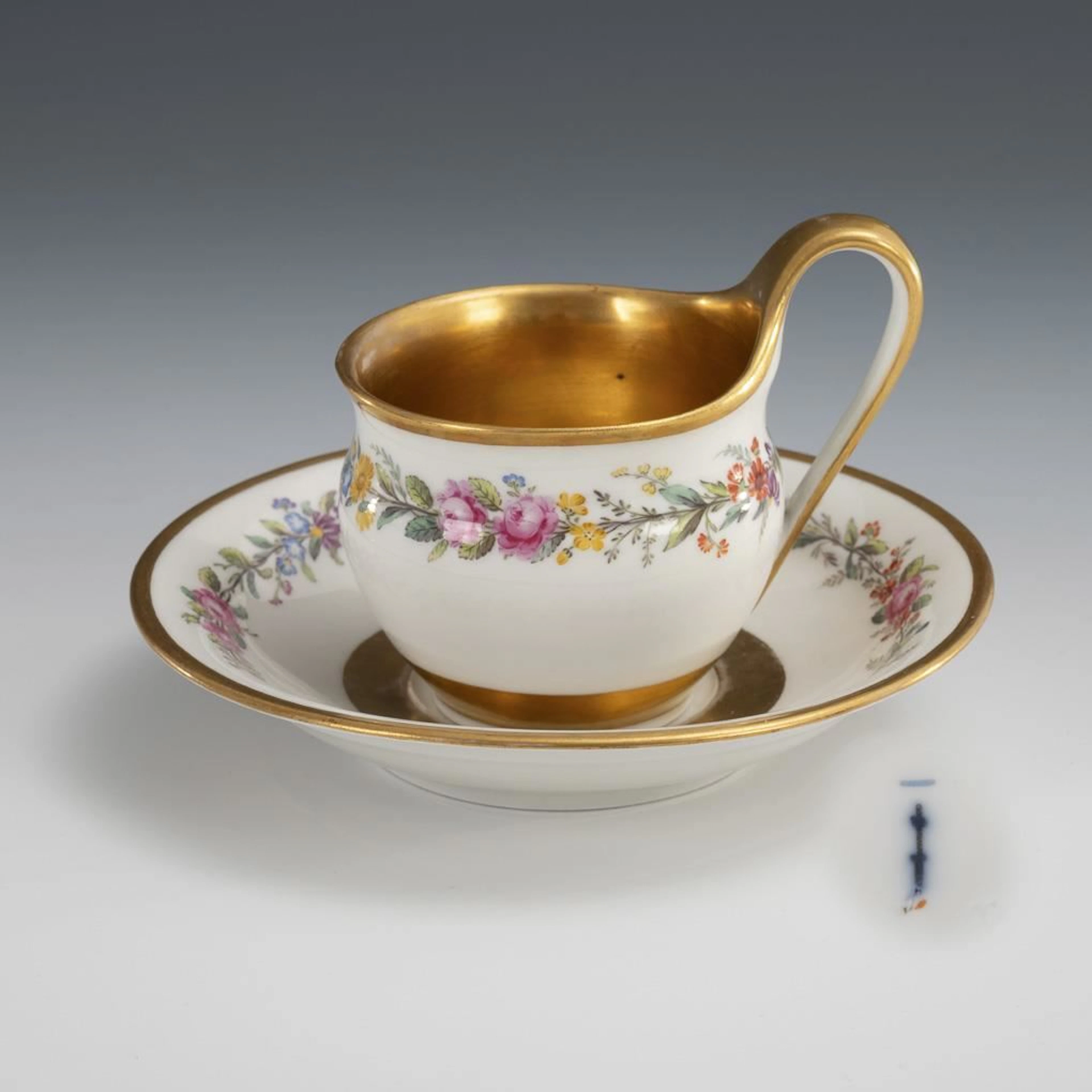 Display cup with floral border. KPM Berlin.