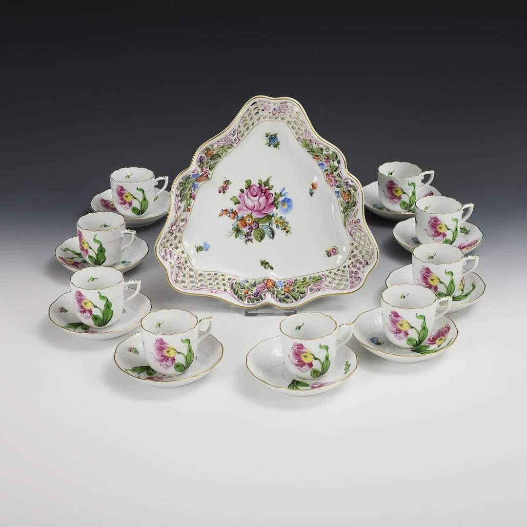 Triangular dish and 9 mocha cups with floral designs. Herend.
