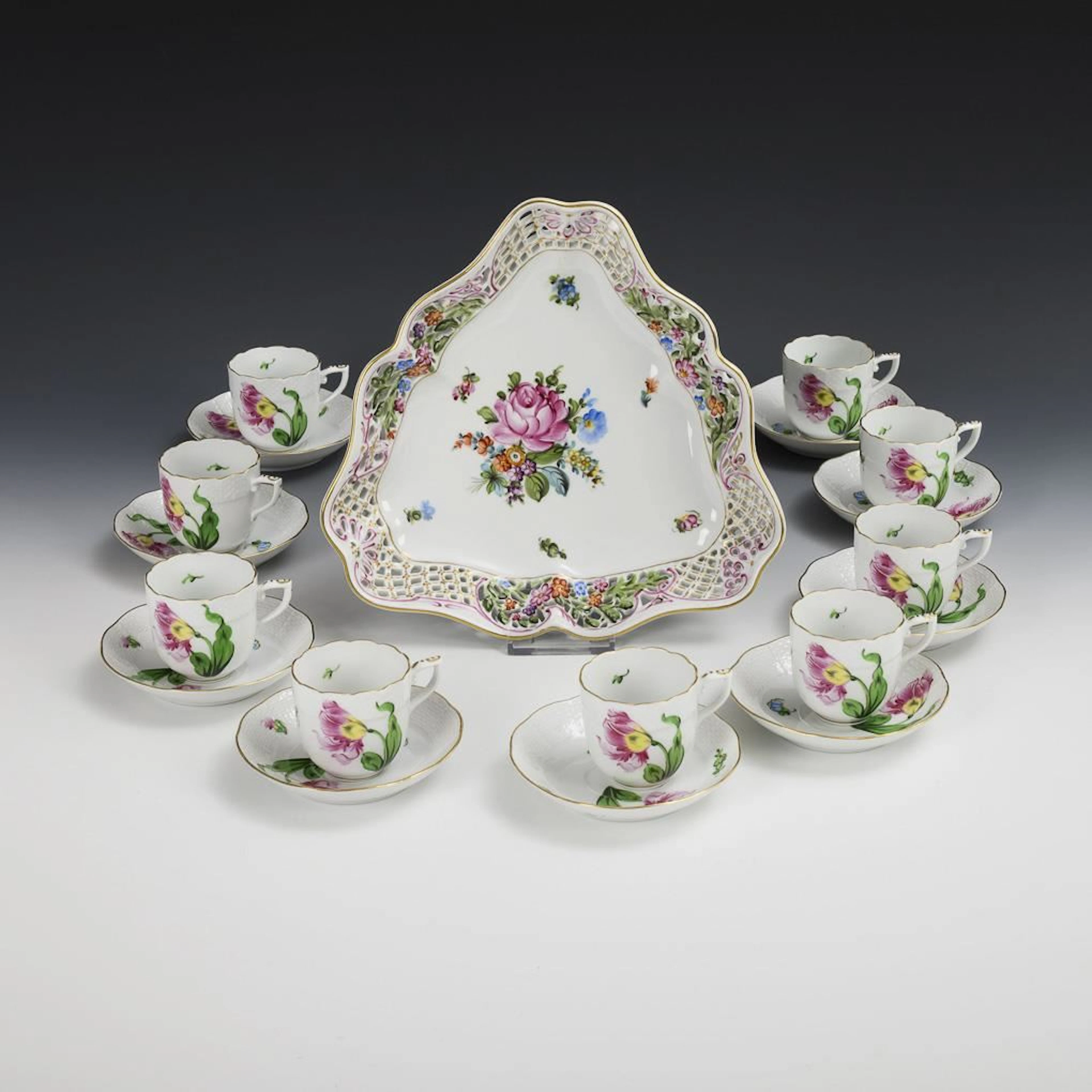 Triangular dish and 9 mocha cups with floral designs. Herend.