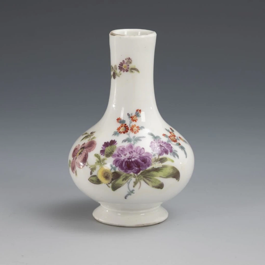 Miniature vase with floral painting. Meissen.