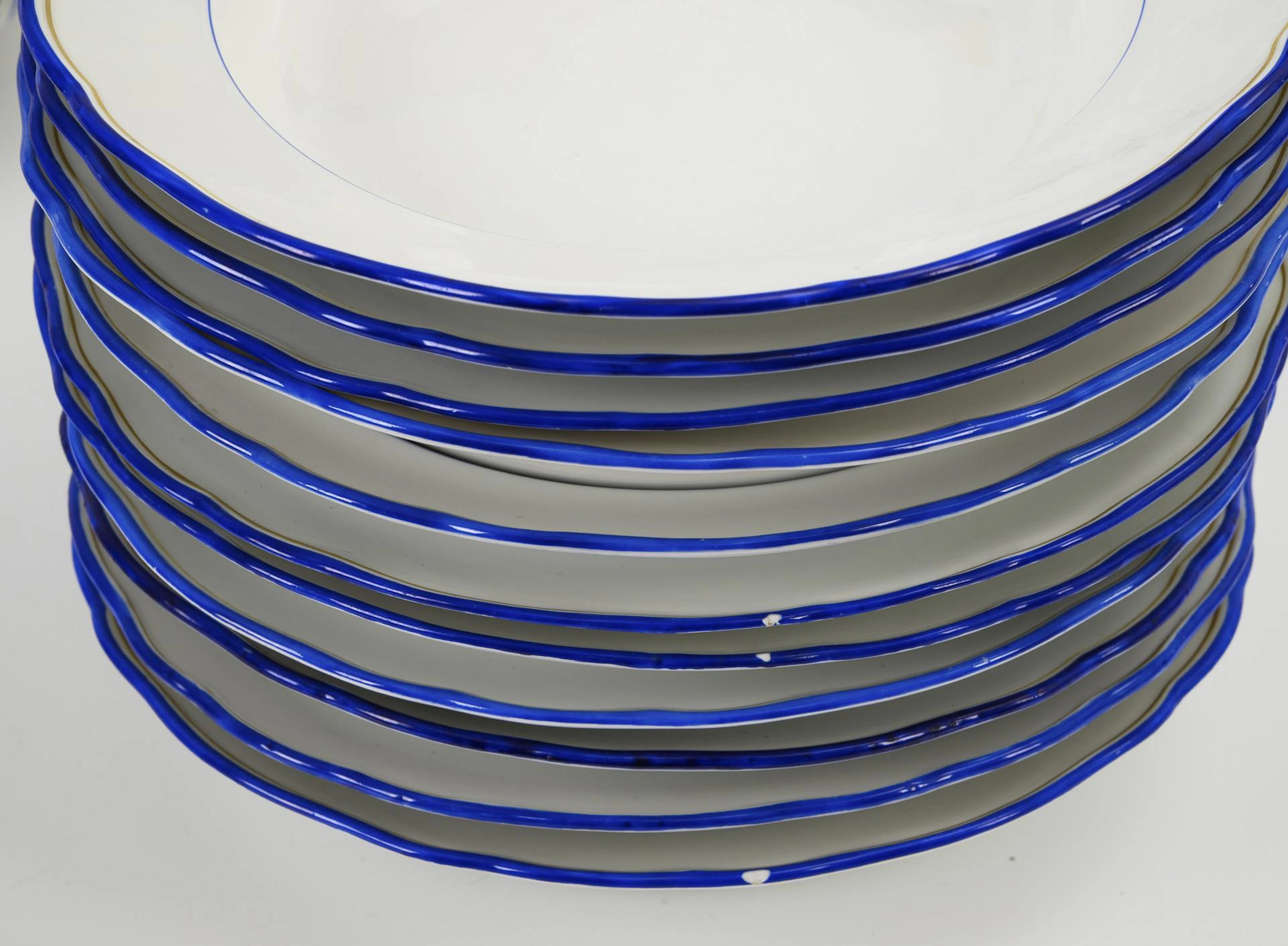33 pieces of a dinner service with blue rim. Meissen.