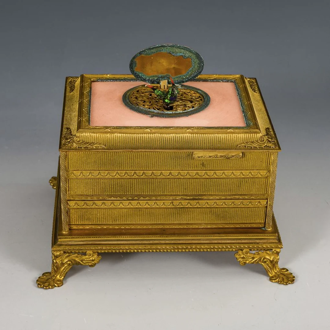 Griesbaum songbird music box with original case.
