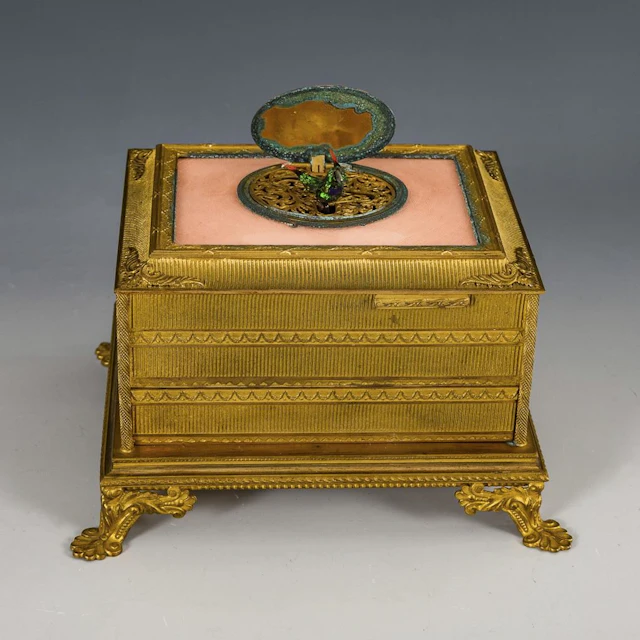Griesbaum songbird music box with original case.
