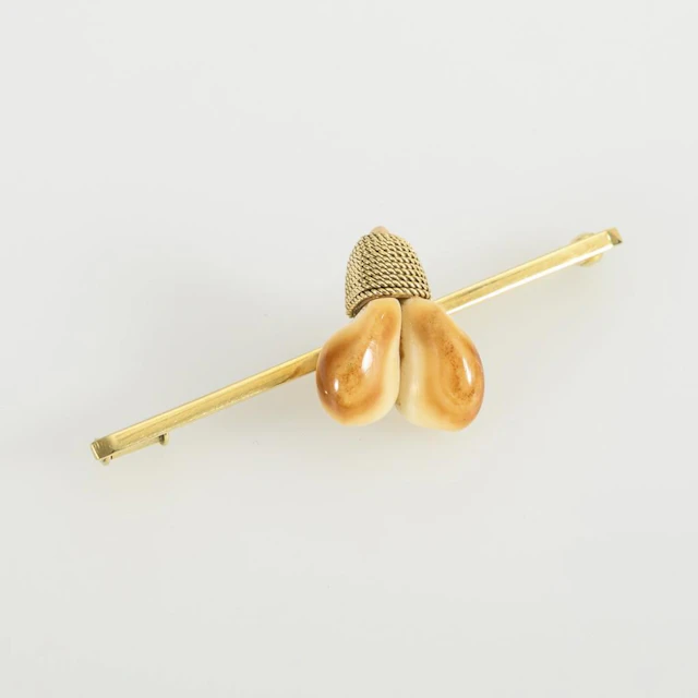 Bar brooch with pendants.