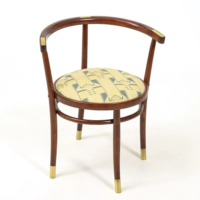Curved-wood armchair.