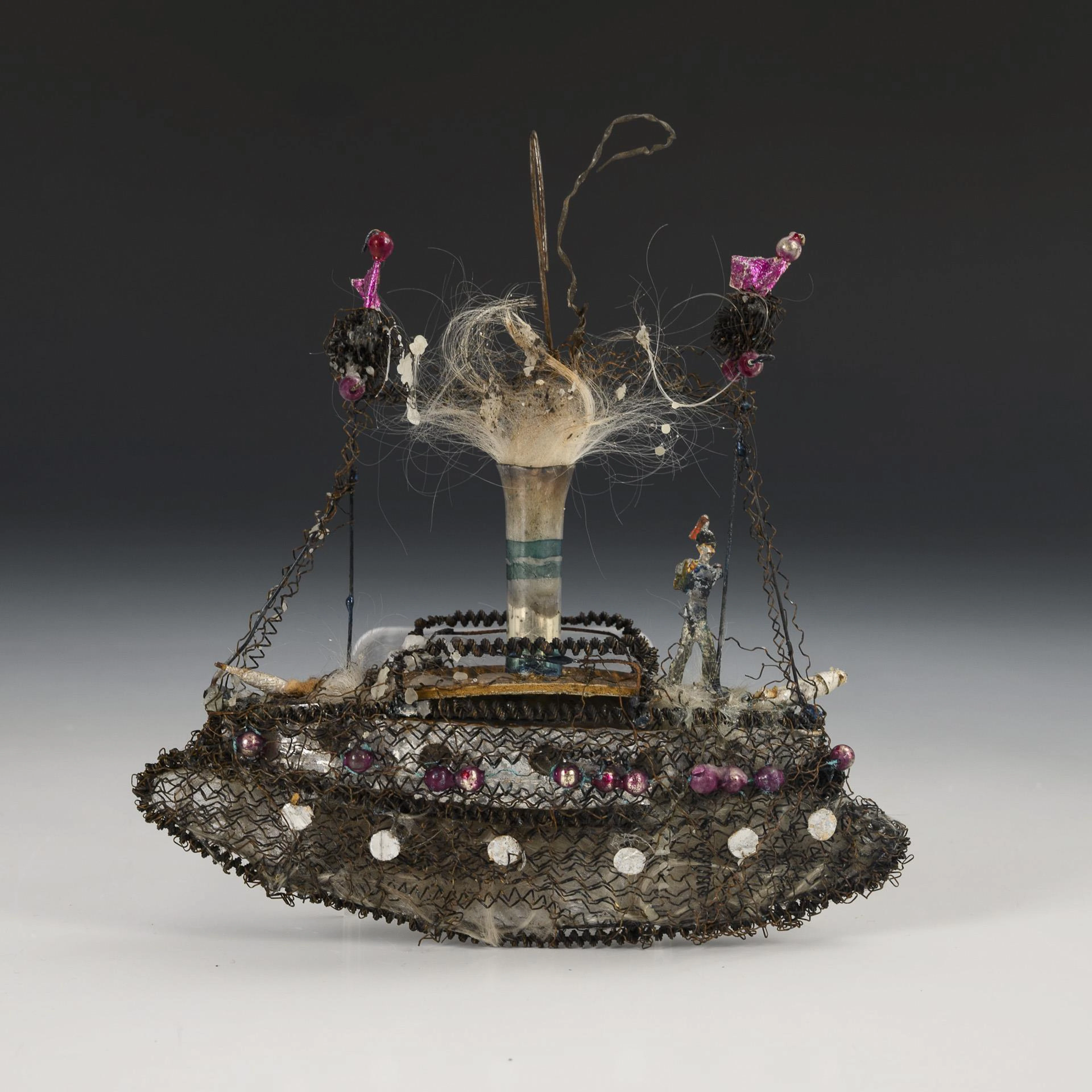 Ship with leonic wires as a Christmas tree decoration.