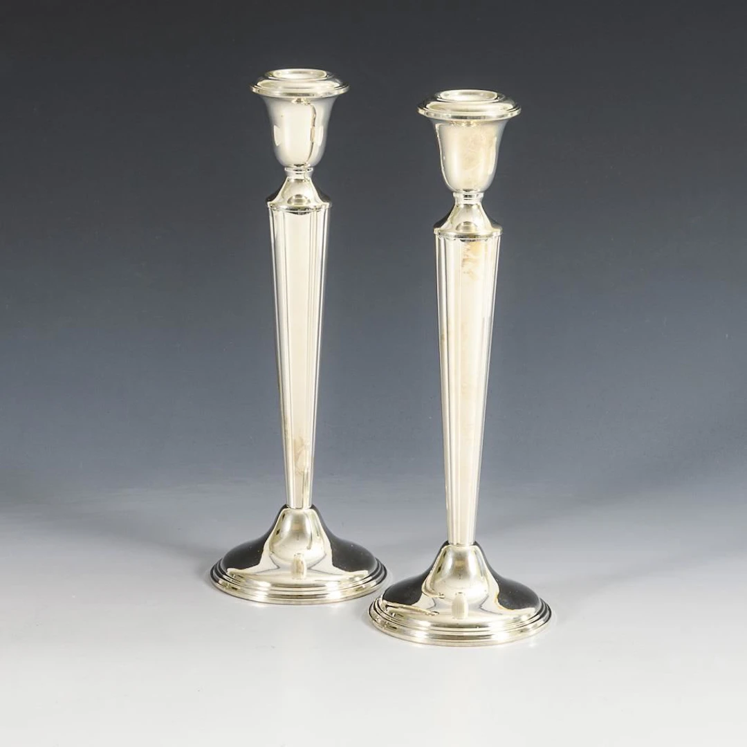 Elegant pair of candlesticks. Empire Sterling.