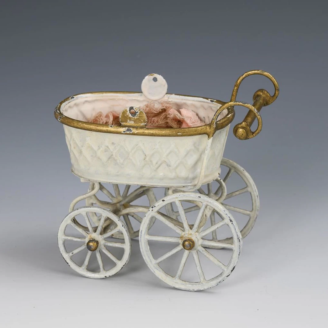 Small dollhouse stroller.