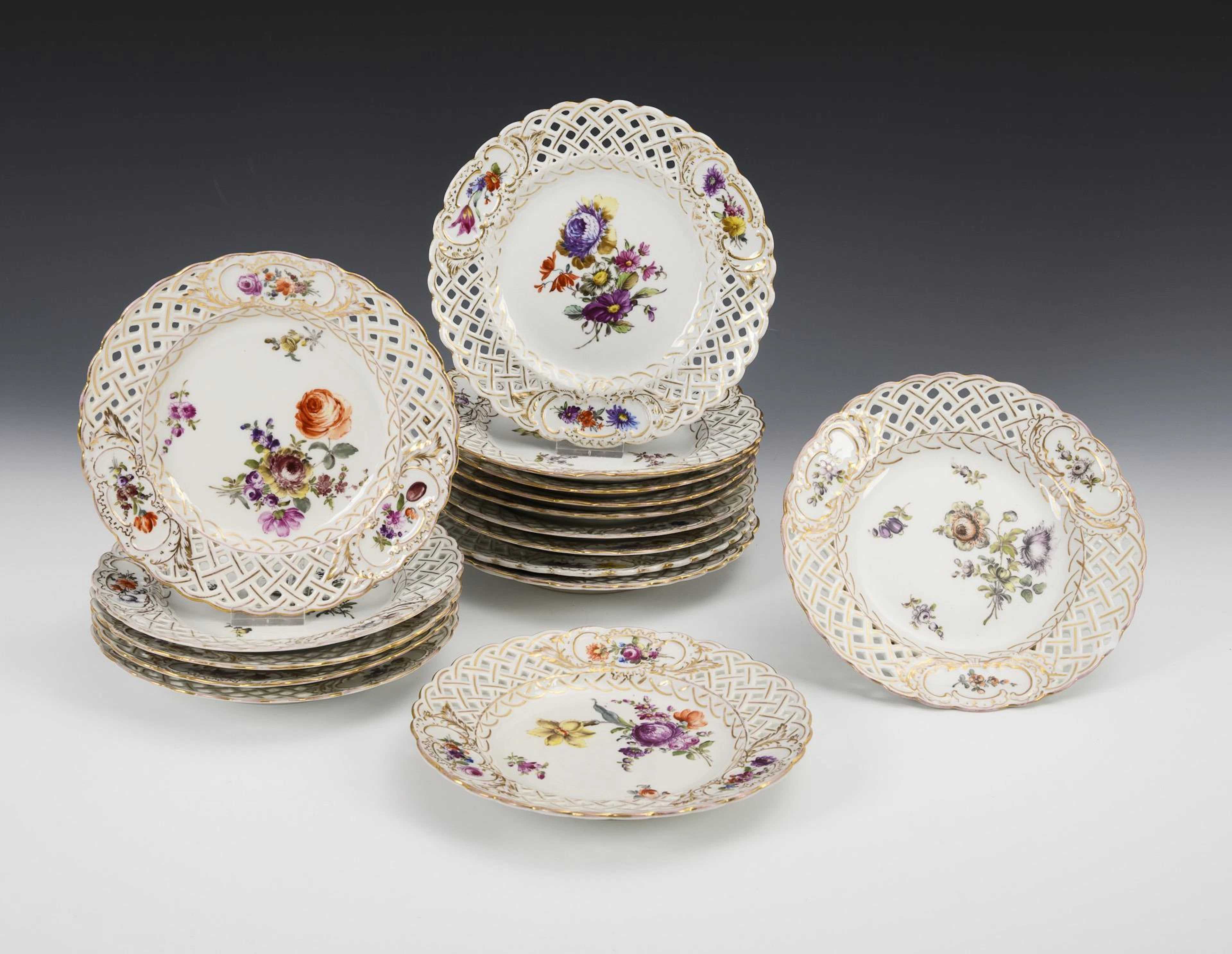 16 breakout plates with flower painting. Helena Wolfsohn.