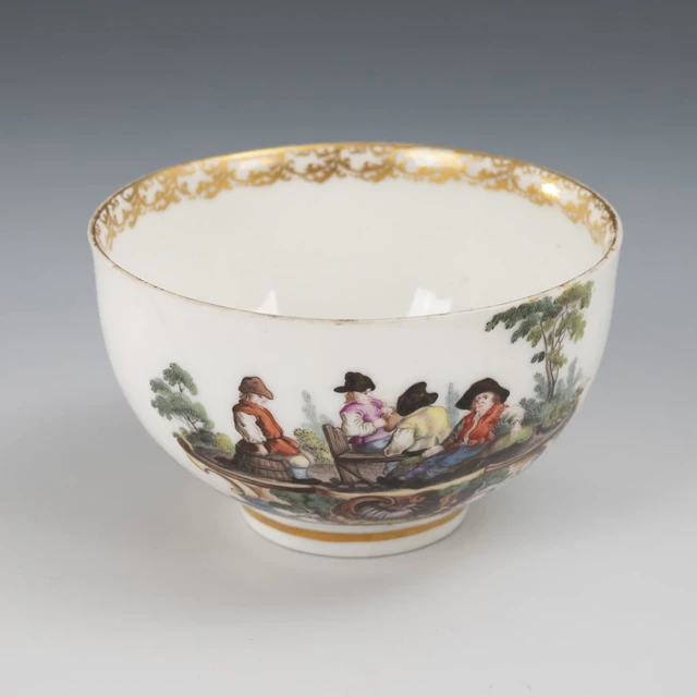 Baroque cup with a peasant motif. Meissen.