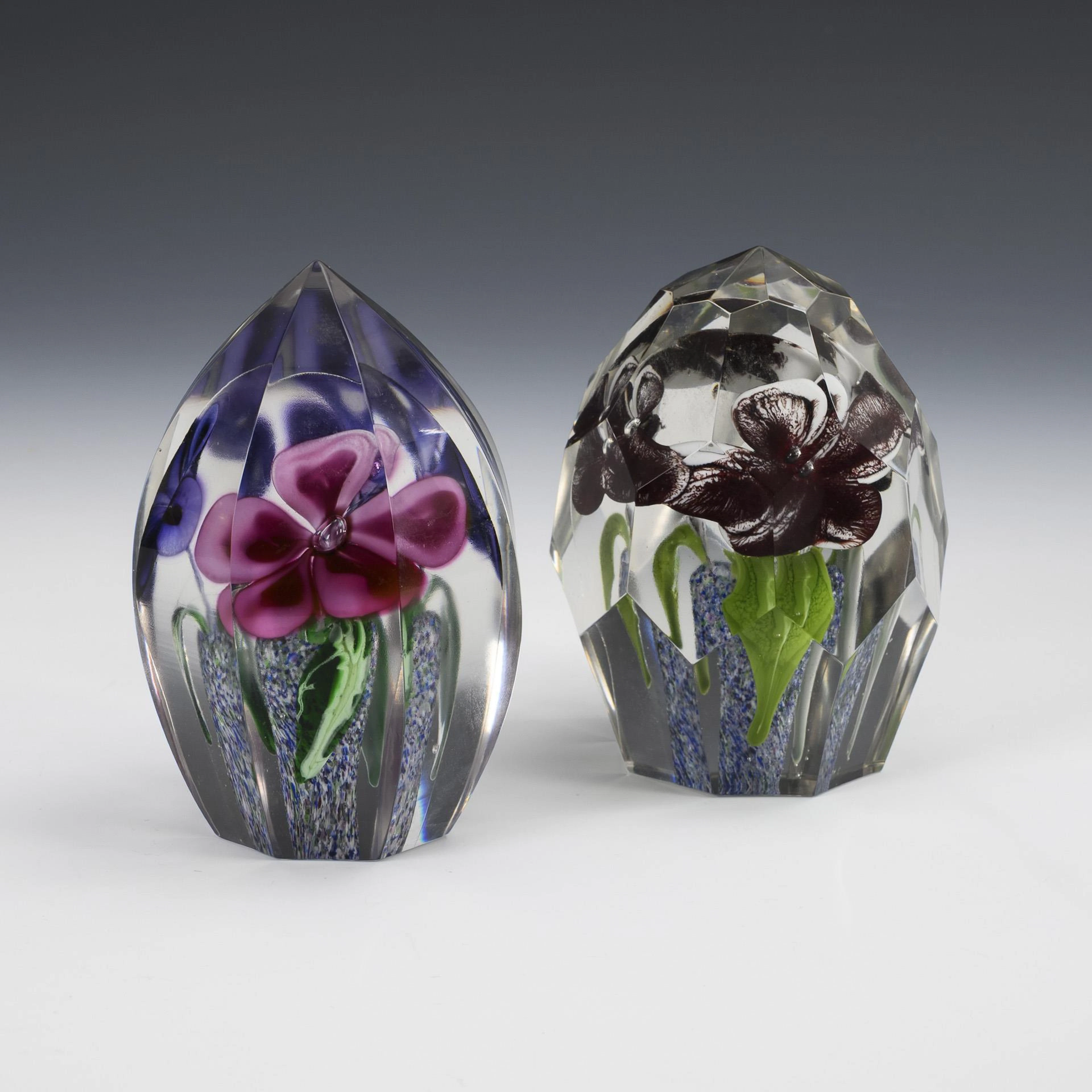 2 large paperweights with flowers.