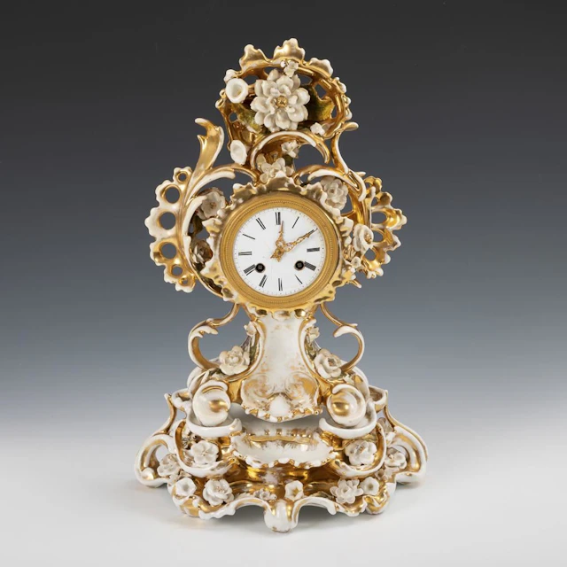 Porcelain clock with base.