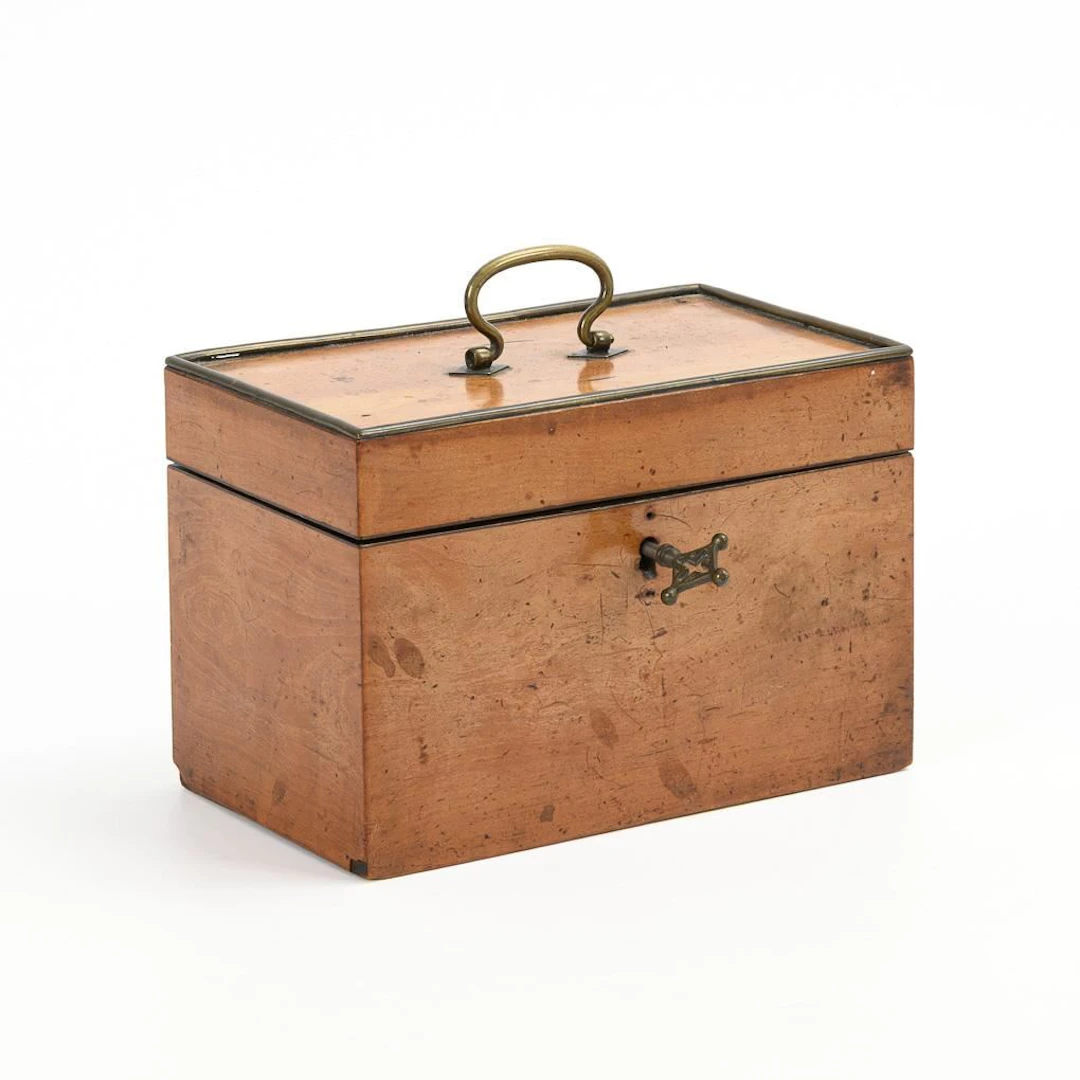 Biedermeier tea box with brass fittings.