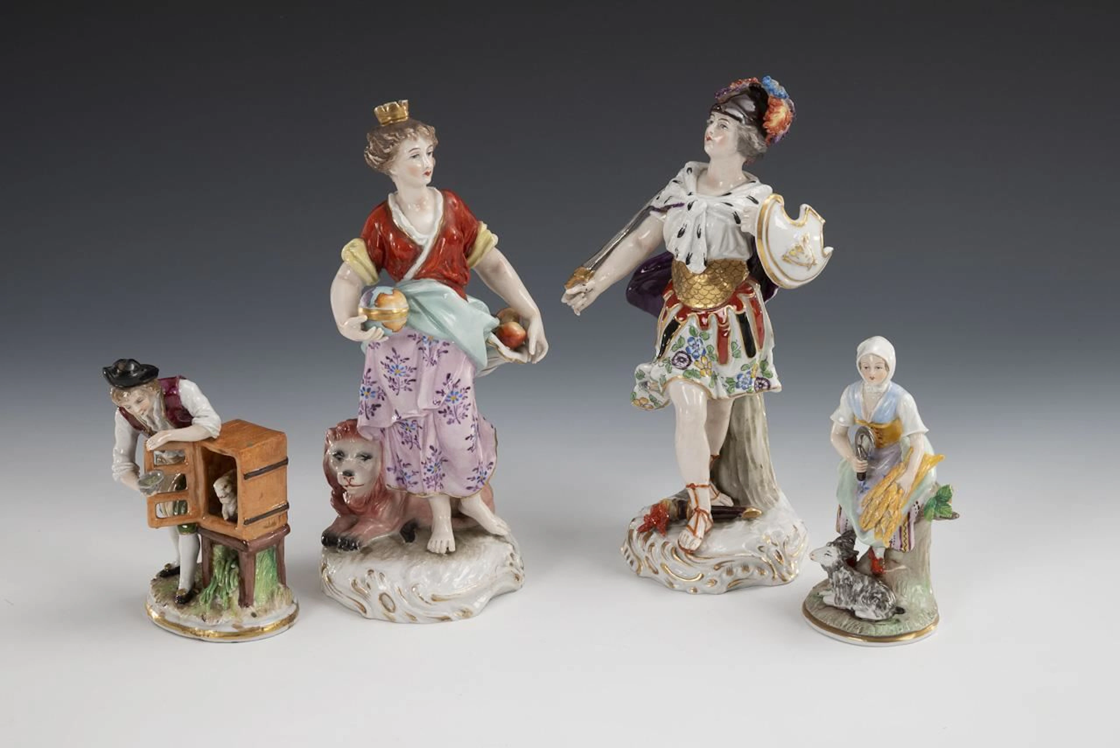 2 mythological figures and 2 peasant figures.