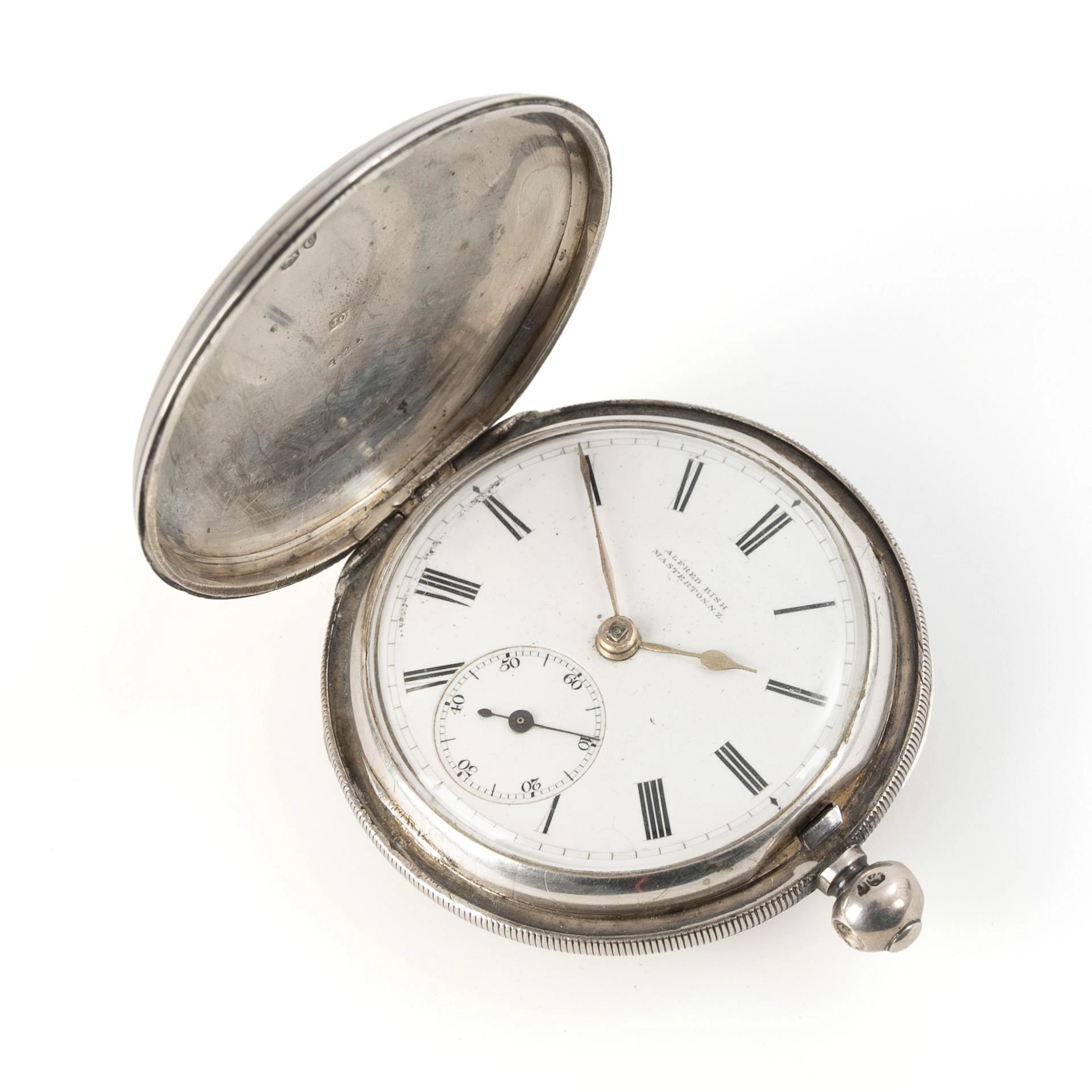 Silver English key pocket watch.