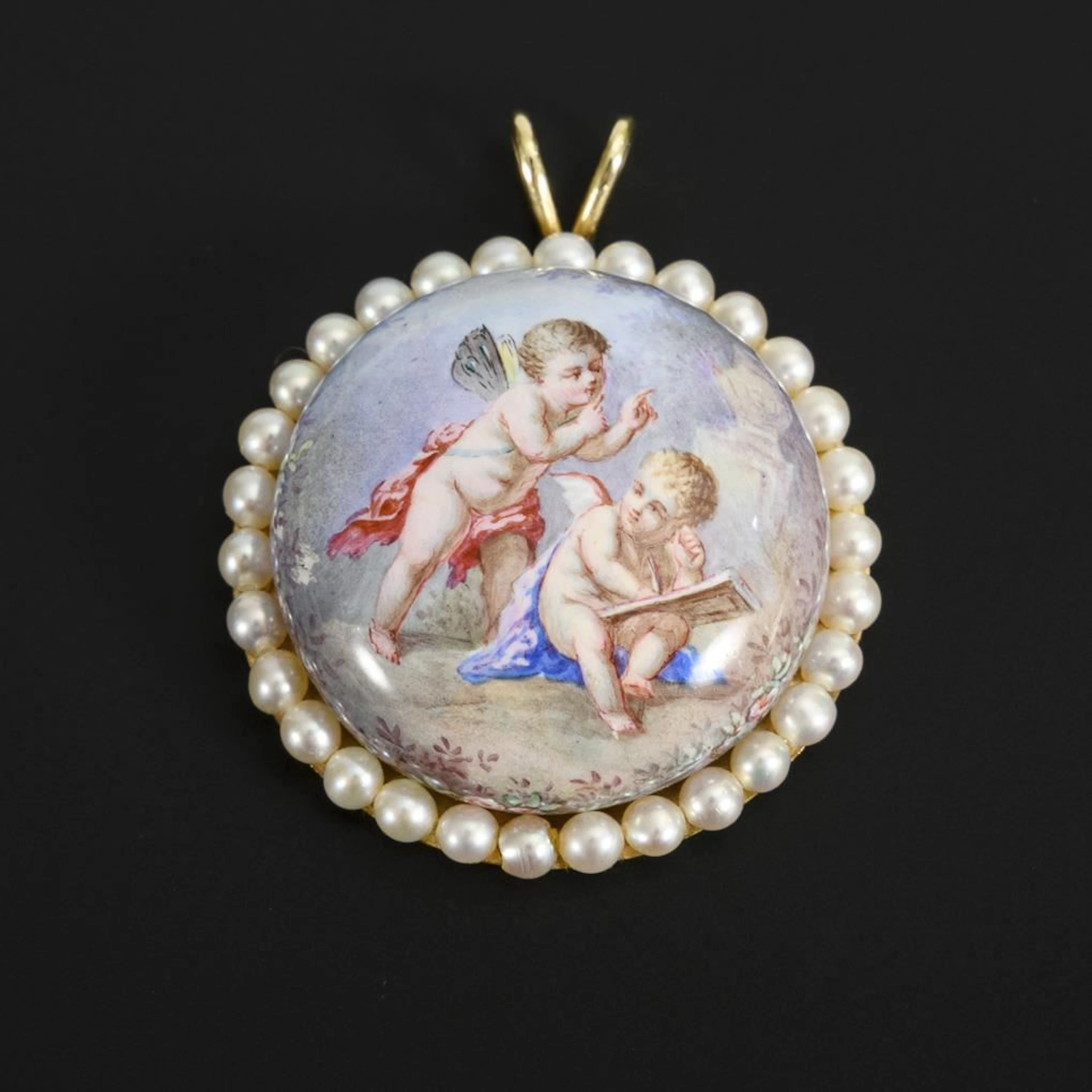Rococo-style pendant.
