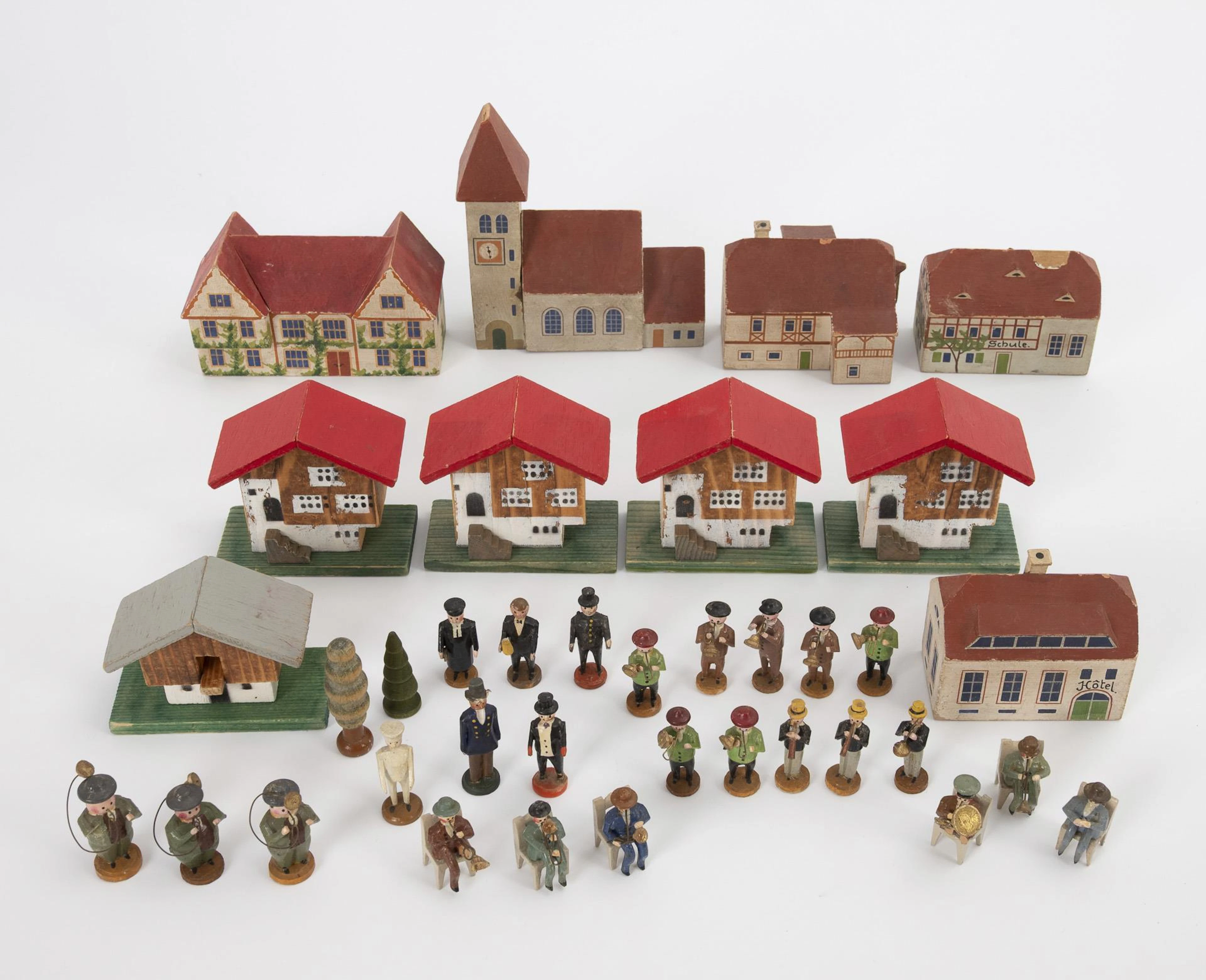 Convolute of houses, church and figures. Erzgebirge.