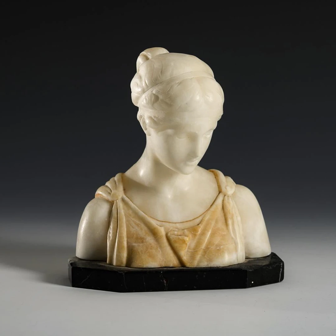 Small antique-style bust of a young woman