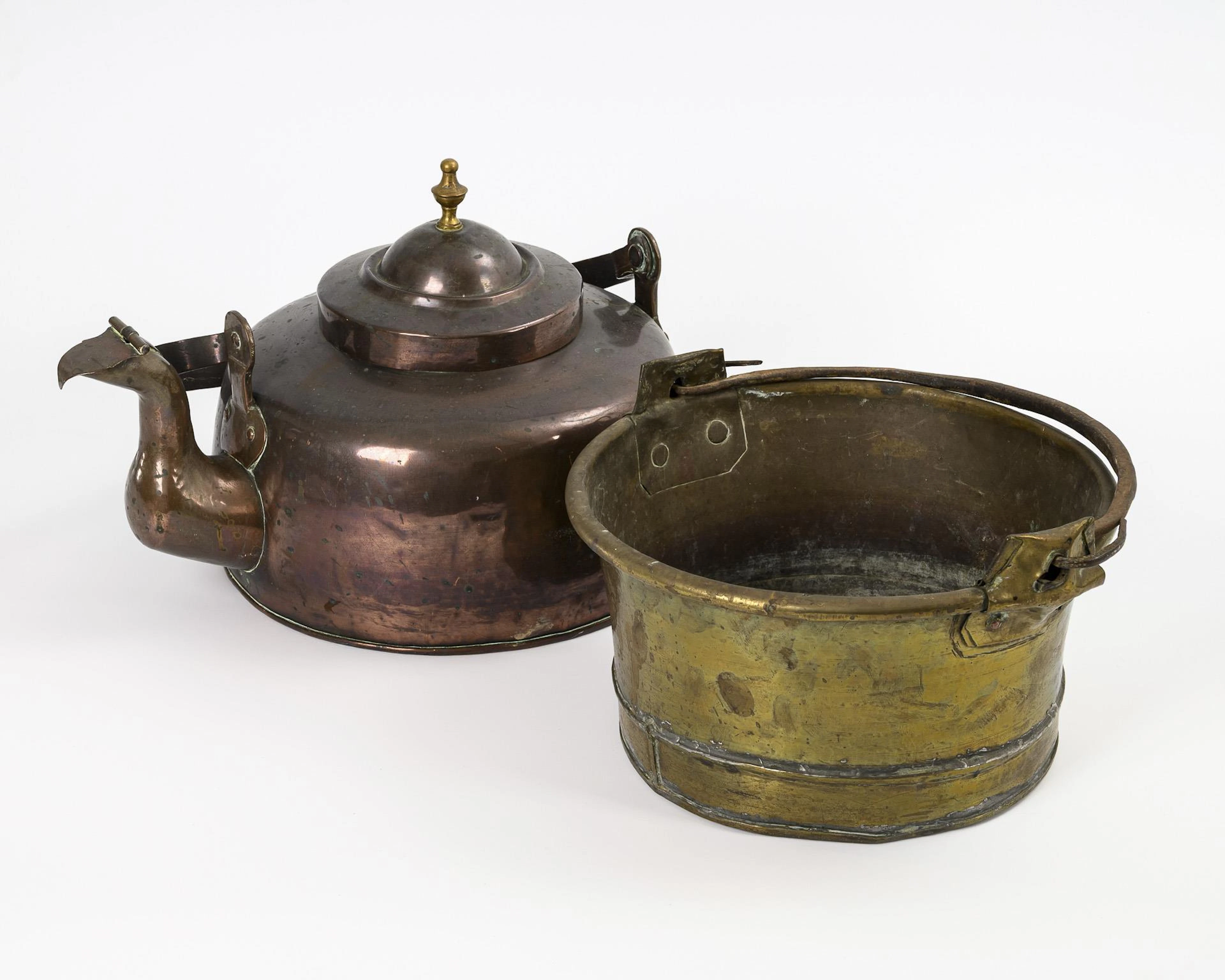 Exceptionally large copper jug and brass bucket.