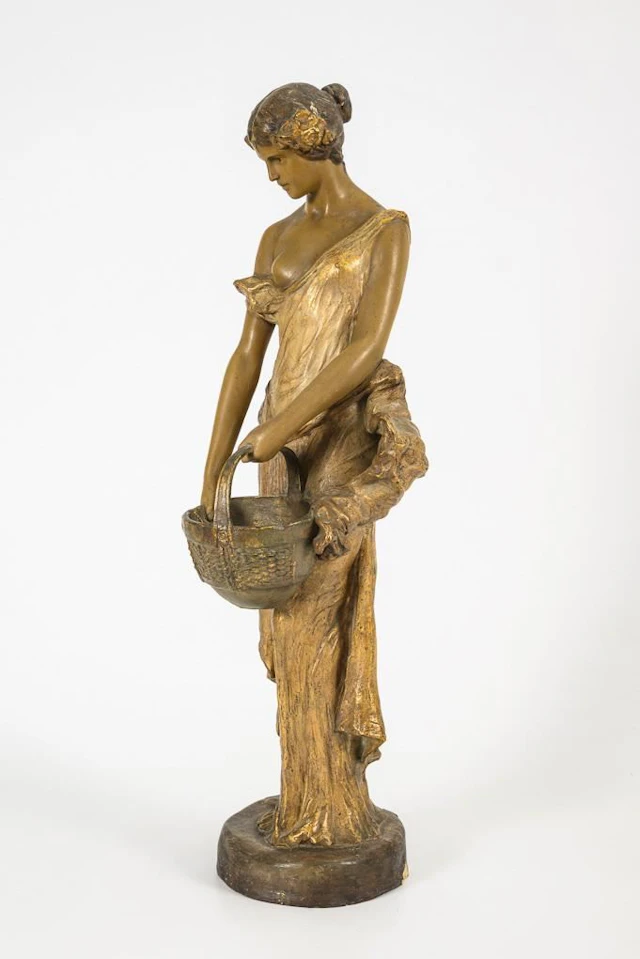 Woman with a Handle Basket. Vienna-based manufacturer Friedrich Goldscheider.