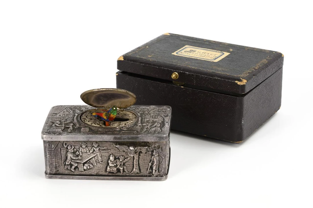 Songbird box, attributed to the Griesbaum company.