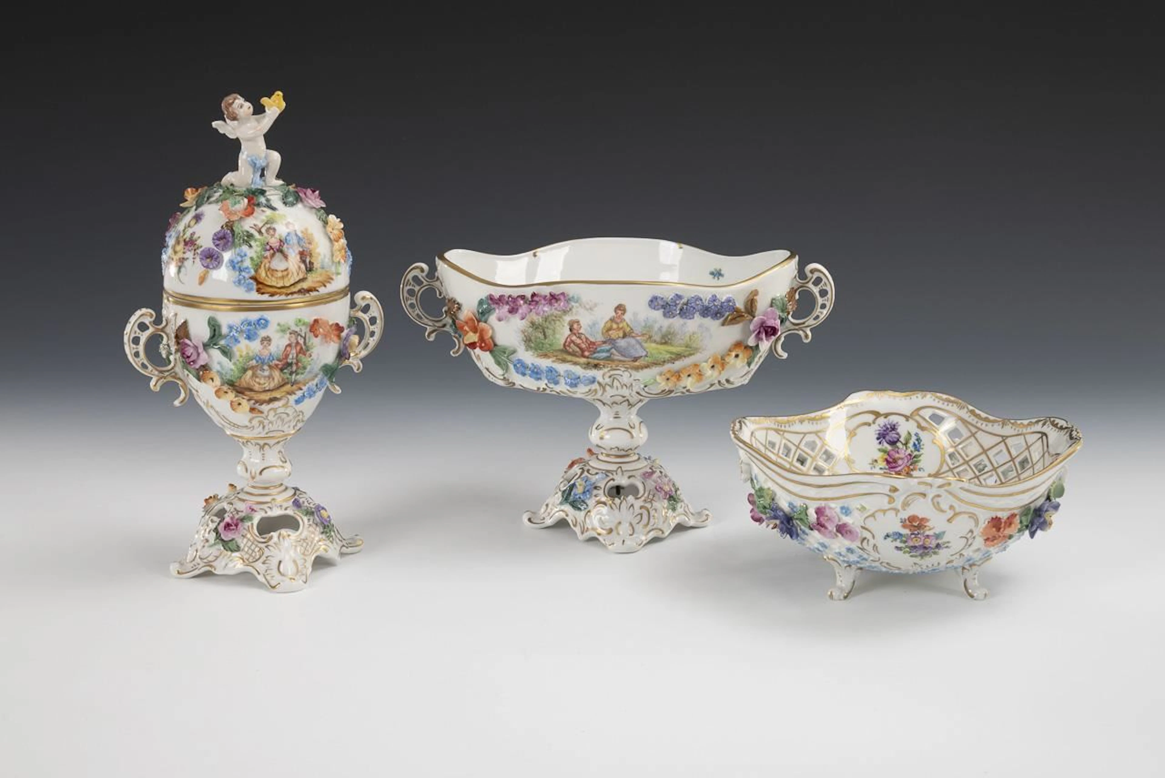Box, foot dish, and openwork dish with floral decoration. Potschappel.