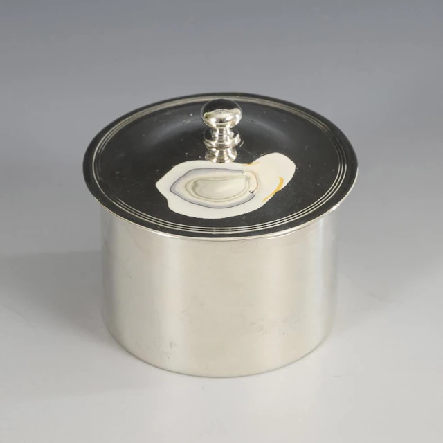 Small silver cylindrical box from the 18th century. John Scofield, London.