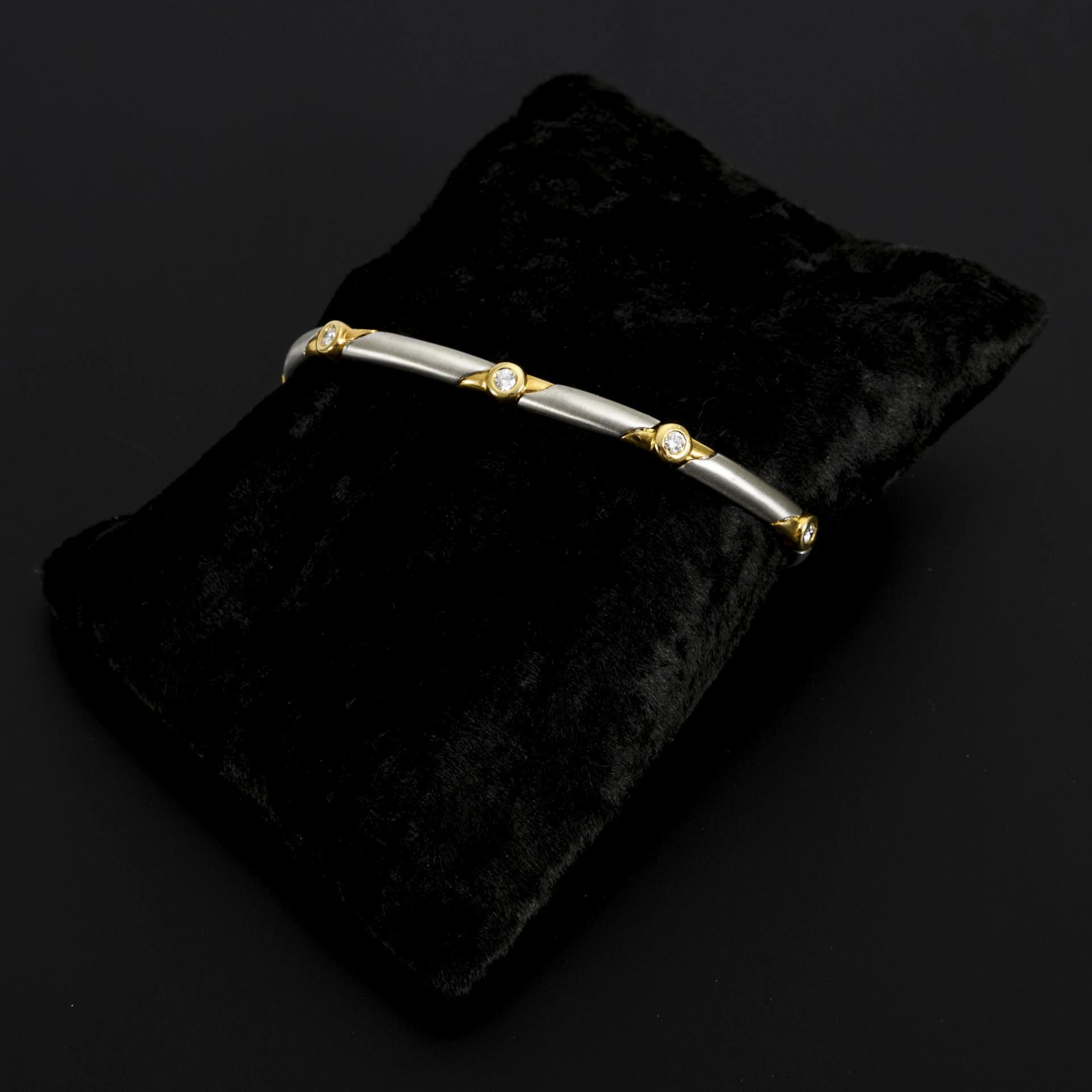 Bicolor bracelet in platinum and yellow gold with diamonds.