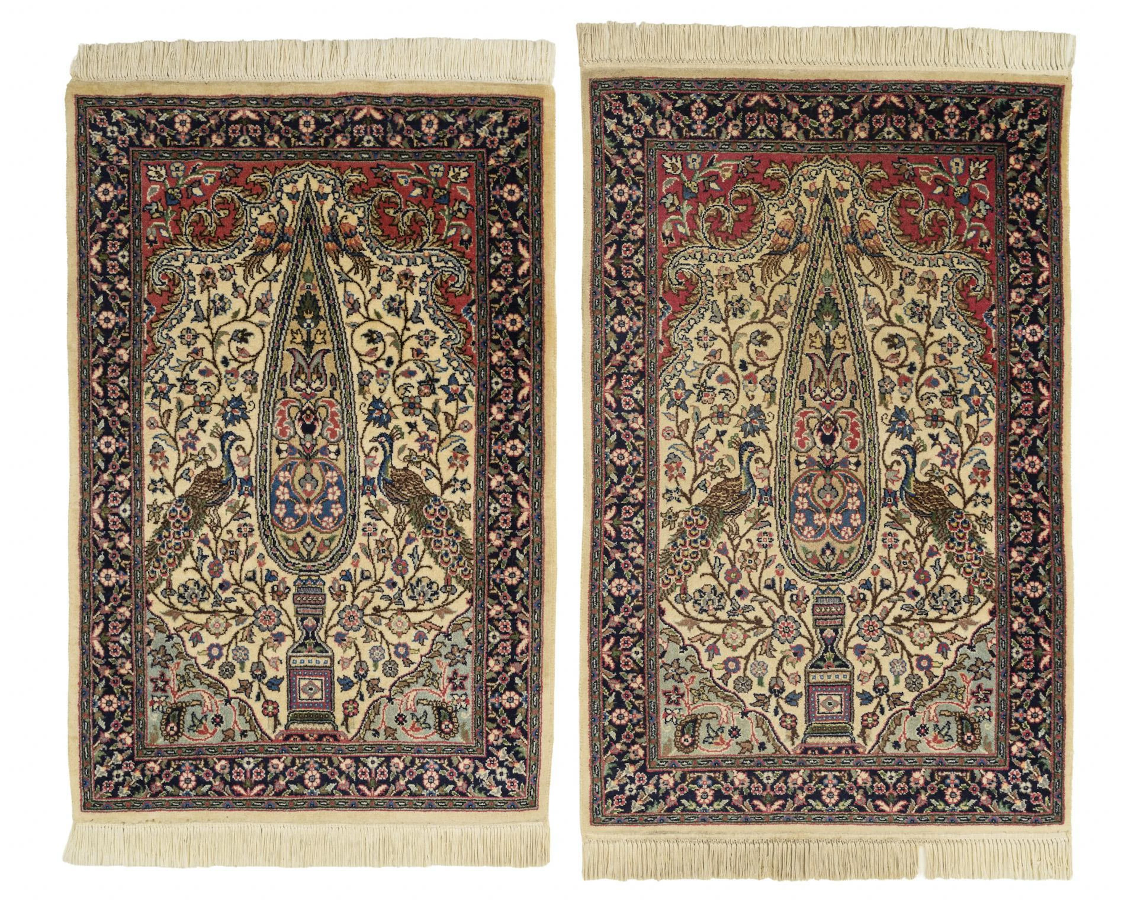 Pair of small oriental rugs with cypress and peacocks.