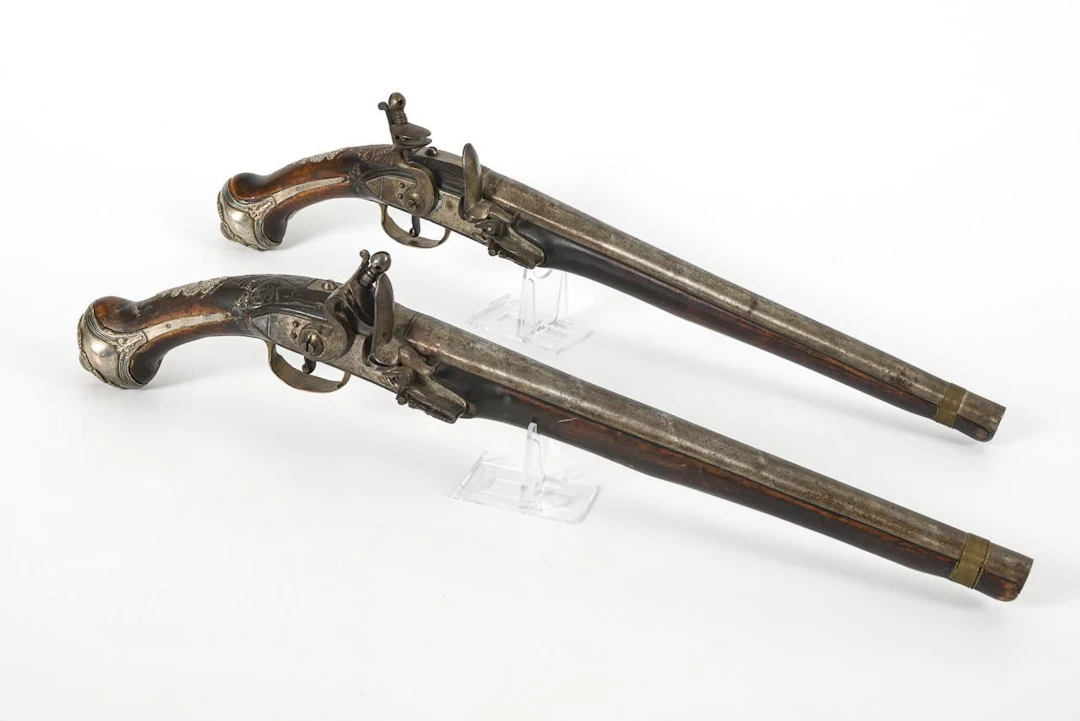 Pair of flintlock pistols.
