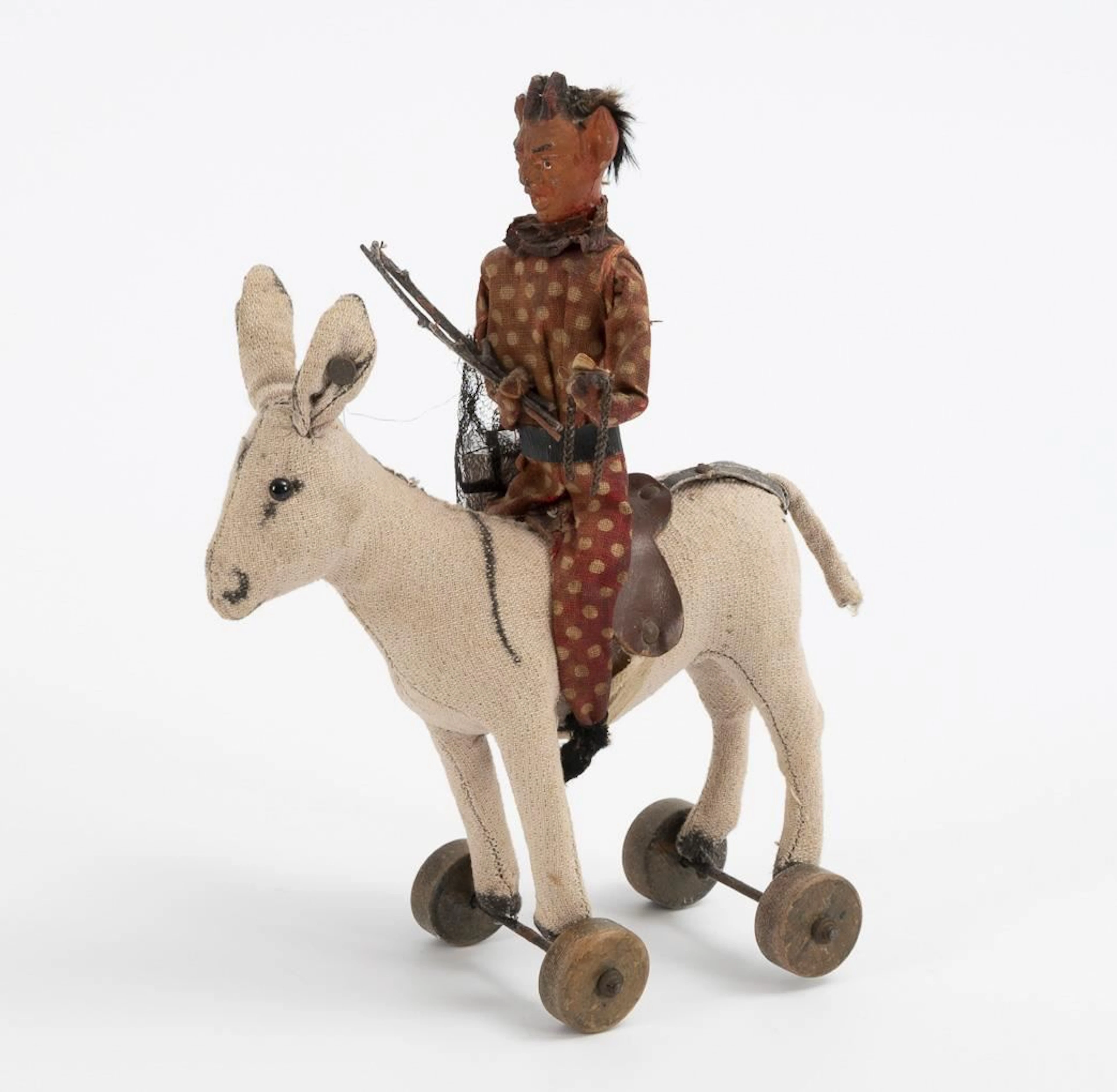 Krampus on a Steiff donkey.