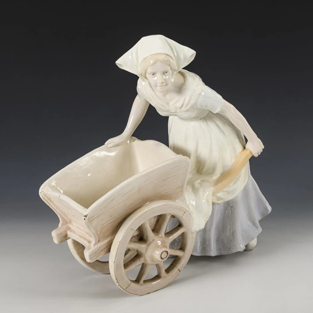 Girl with a Wheelbarrow. Vienna-based manufacturer Friedrich Goldscheider.