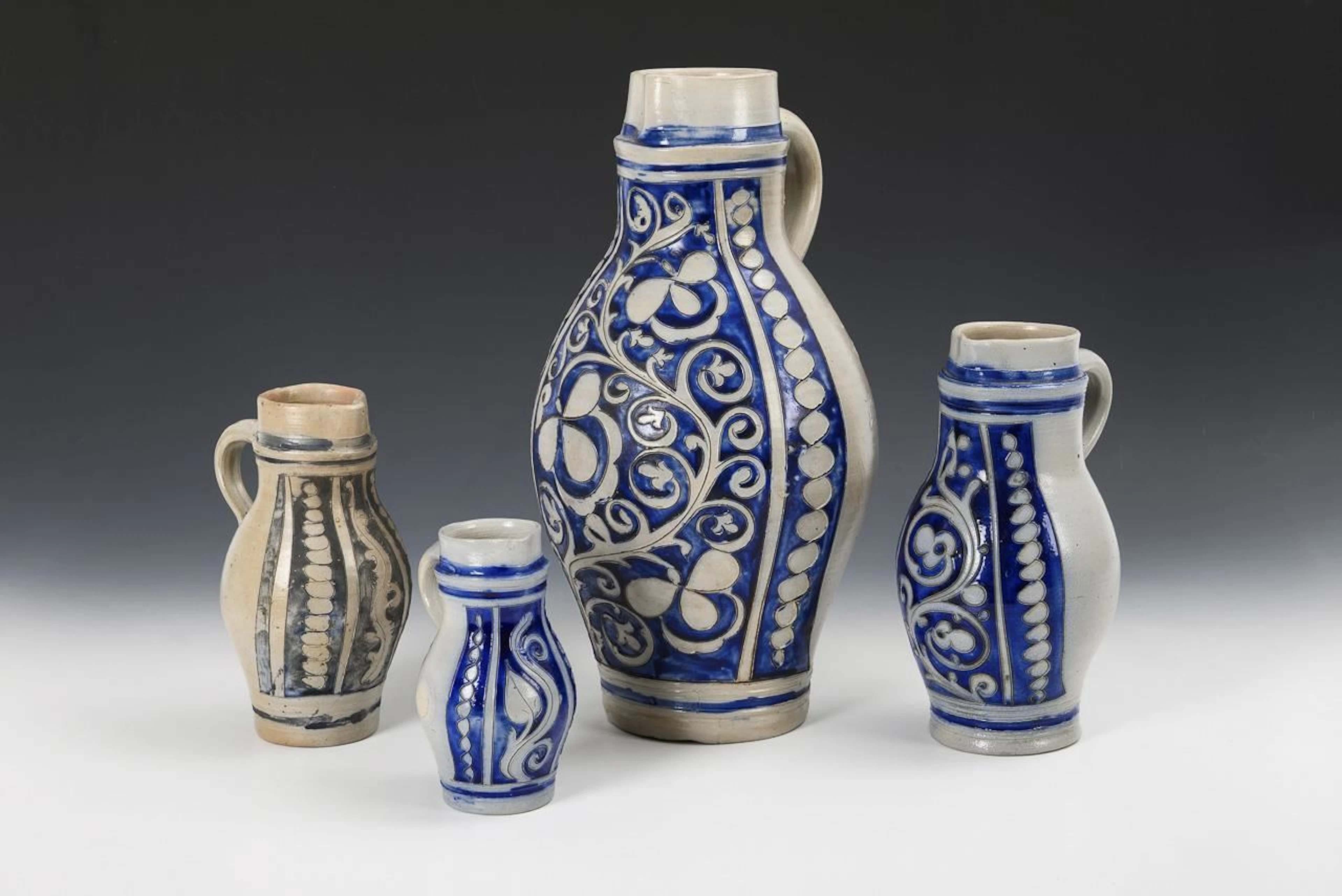 4 pear-shaped jugs. Westerwald.