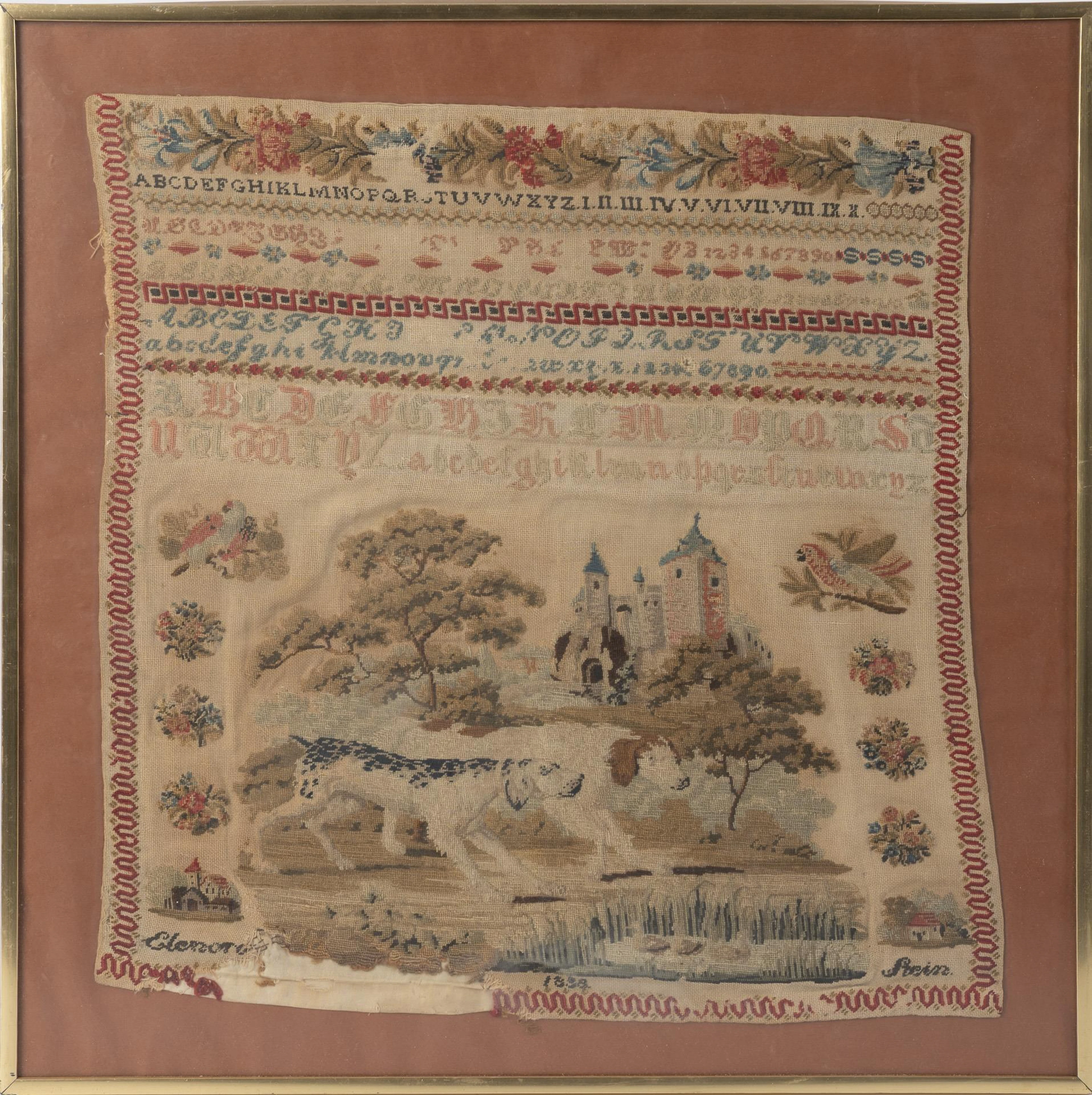 Biedermeier embroidered sampler with landscape and hunting dog.