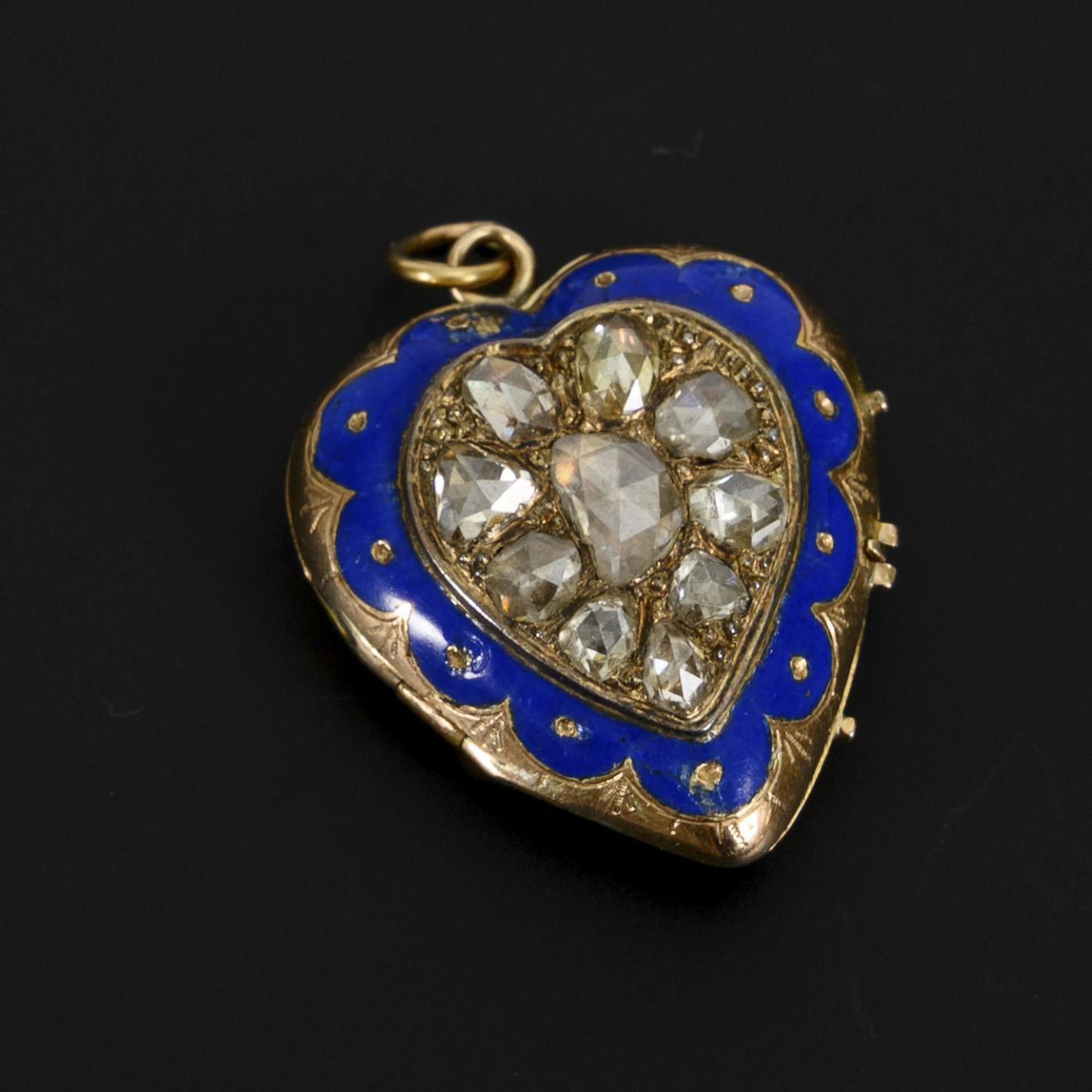 Historical medallion pendant with rich diamond setting.