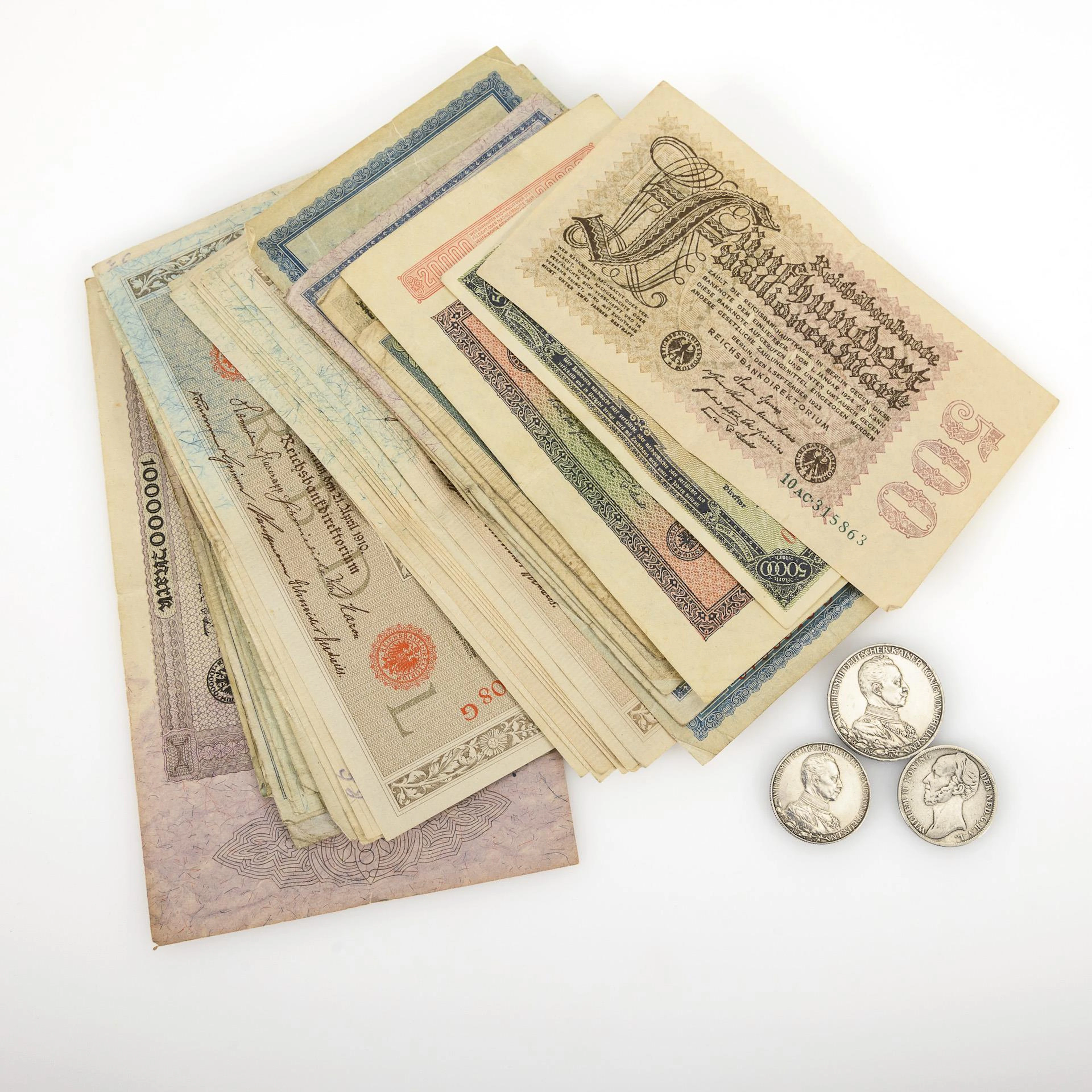 Collection of 39 banknotes and 3 coins.