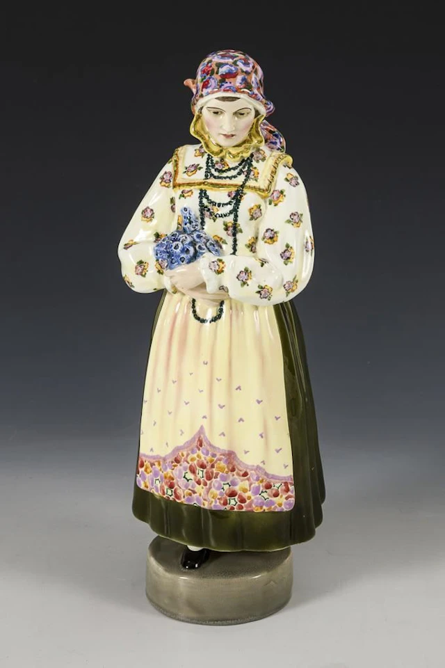 Standing Woman in Traditional Costume. Vienna-based manufacturer Friedrich