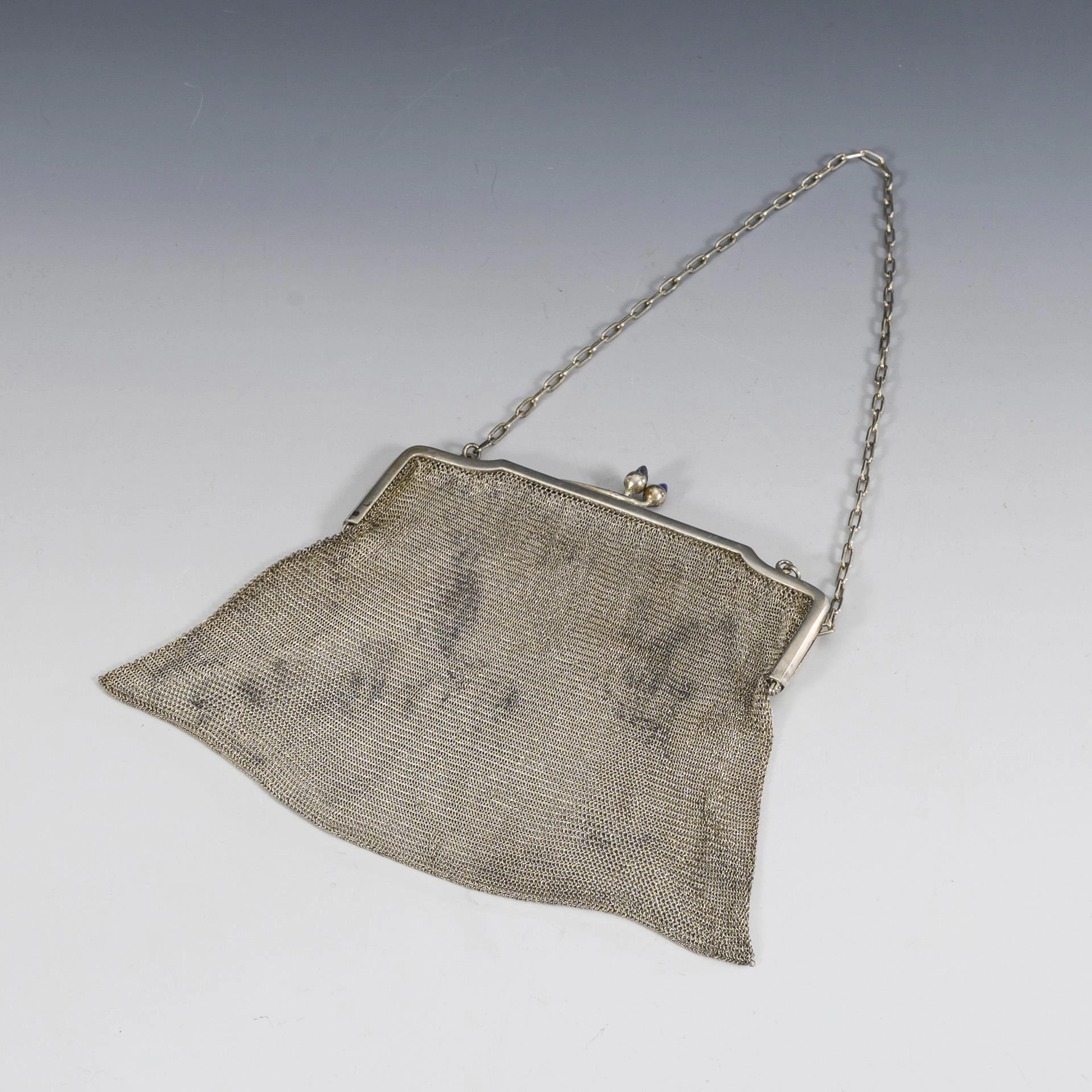 Silver chain bag.
