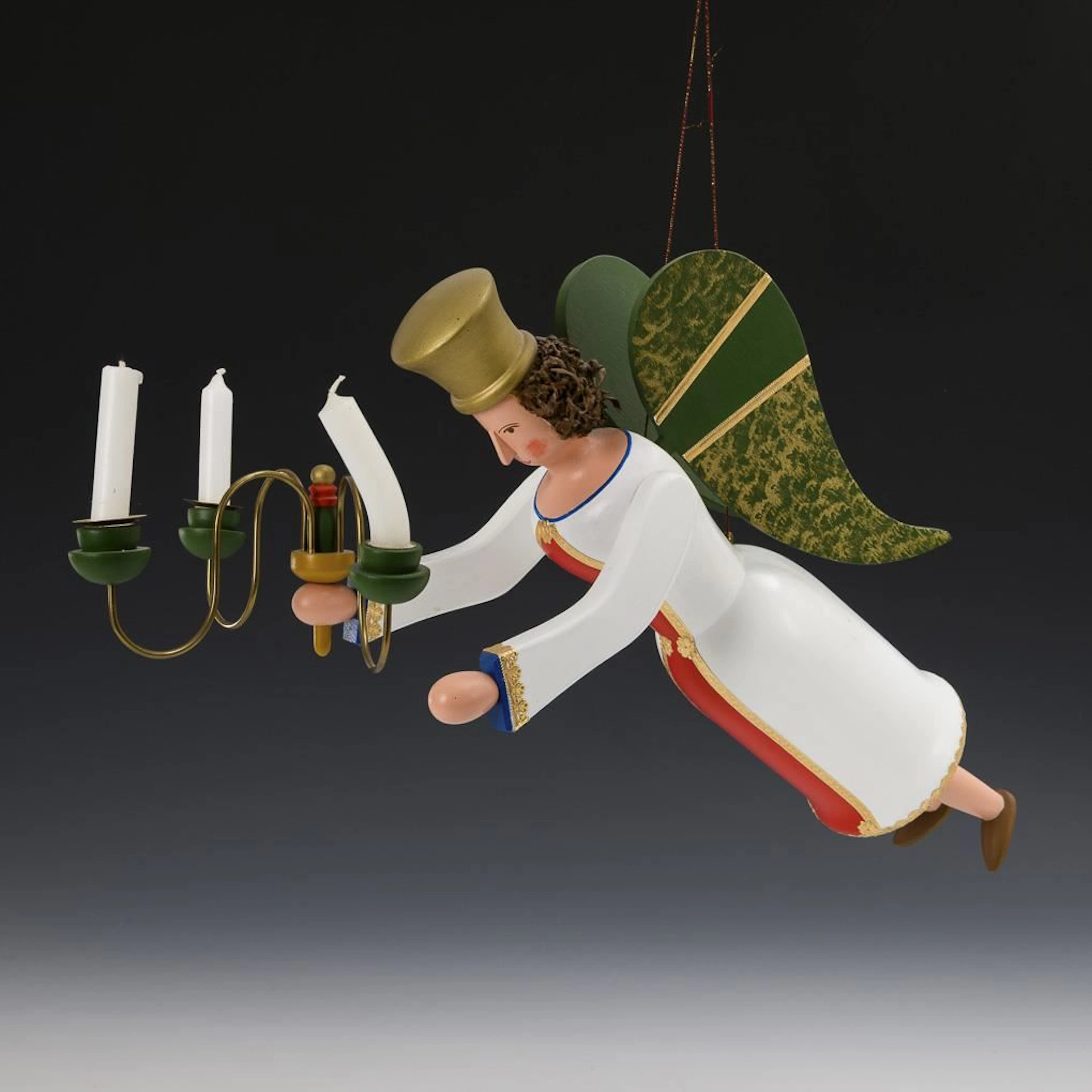 Floating angel with green wings. Joachim Sünderhauf.