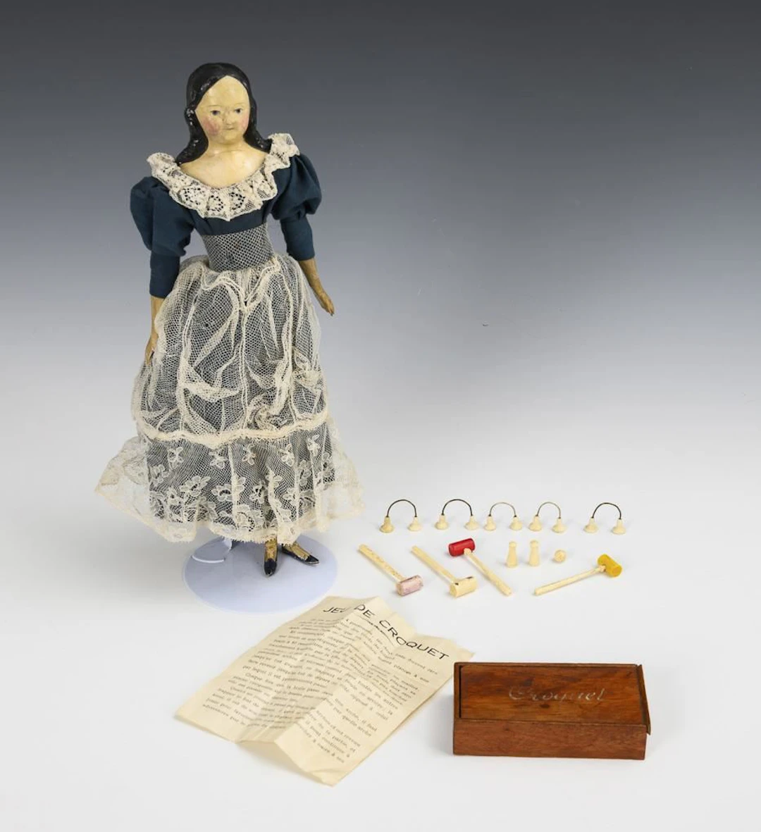 Biedermeier bust doll and "Croquet" game.