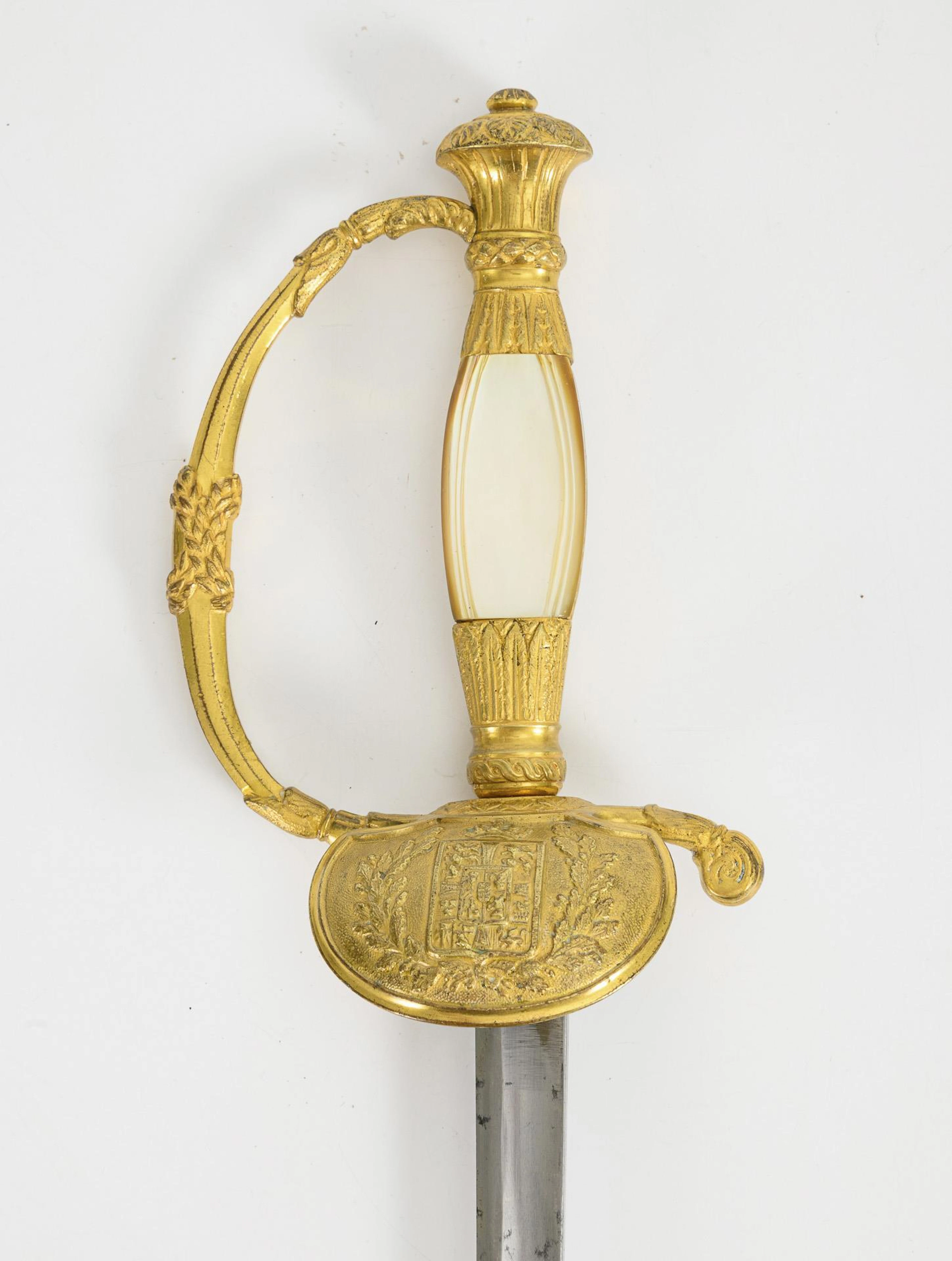 Sword with mother-of-pearl grip and coat of arms of Denmark.