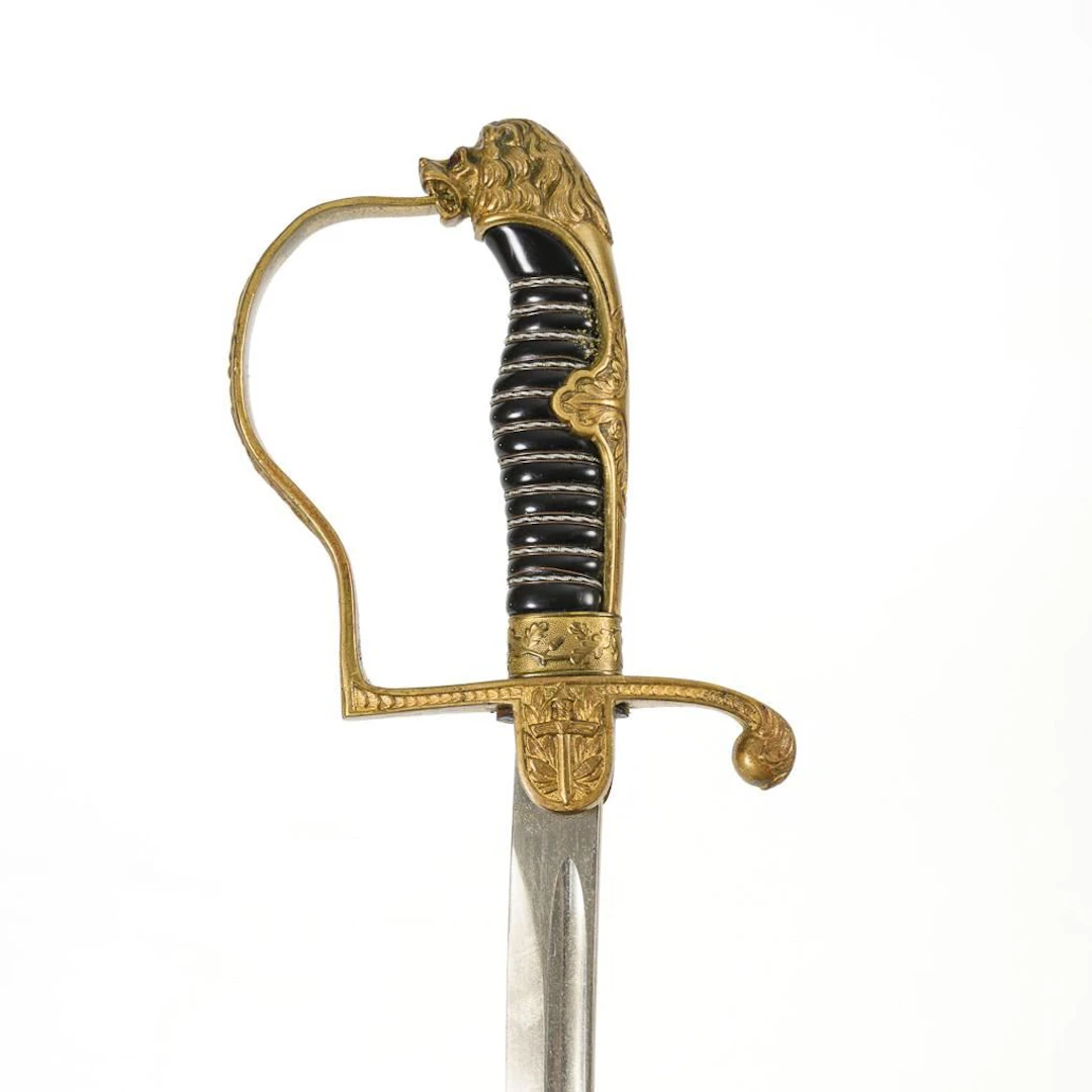 Lion's-head saber with scabbard.
