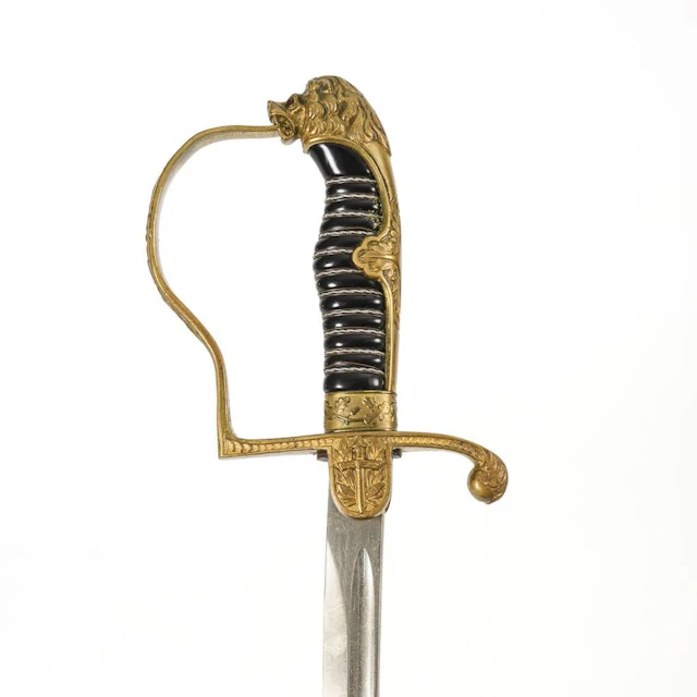 Lion's-head saber with scabbard.