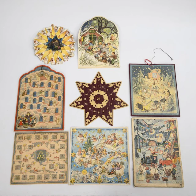 Collection of 8 old Advent calendars.