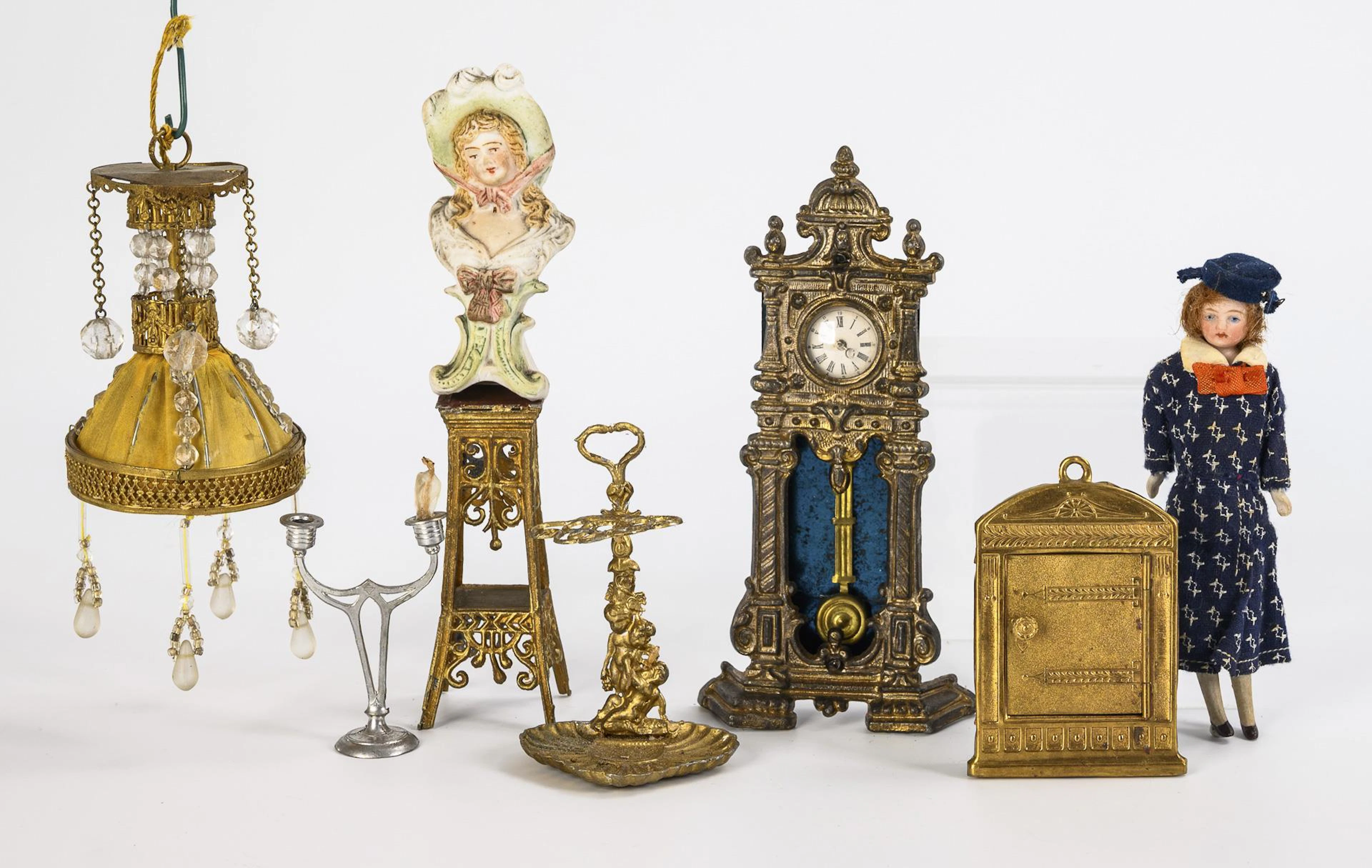 A collection of Art Nouveau doll's house accessories.