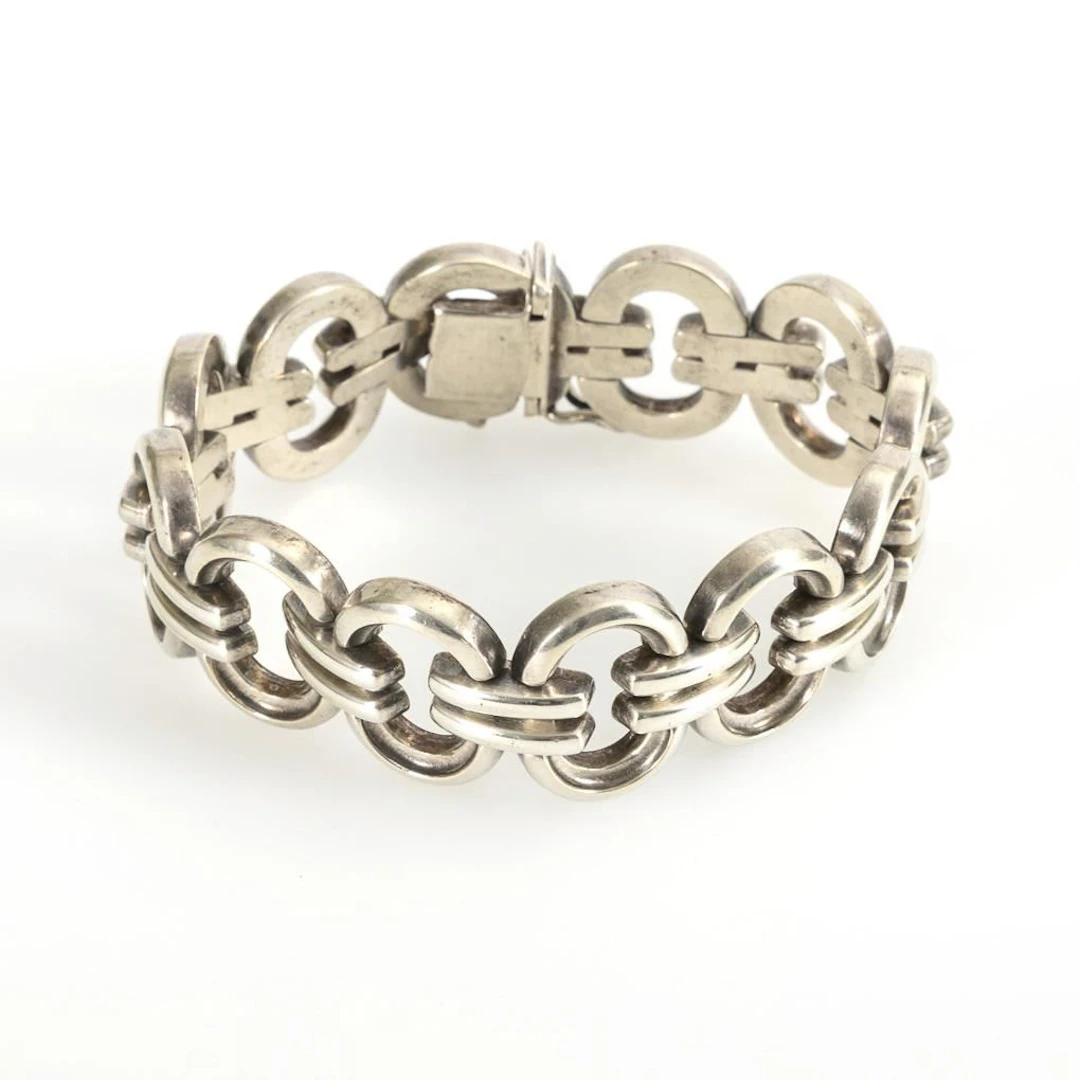 Silver link bracelet.