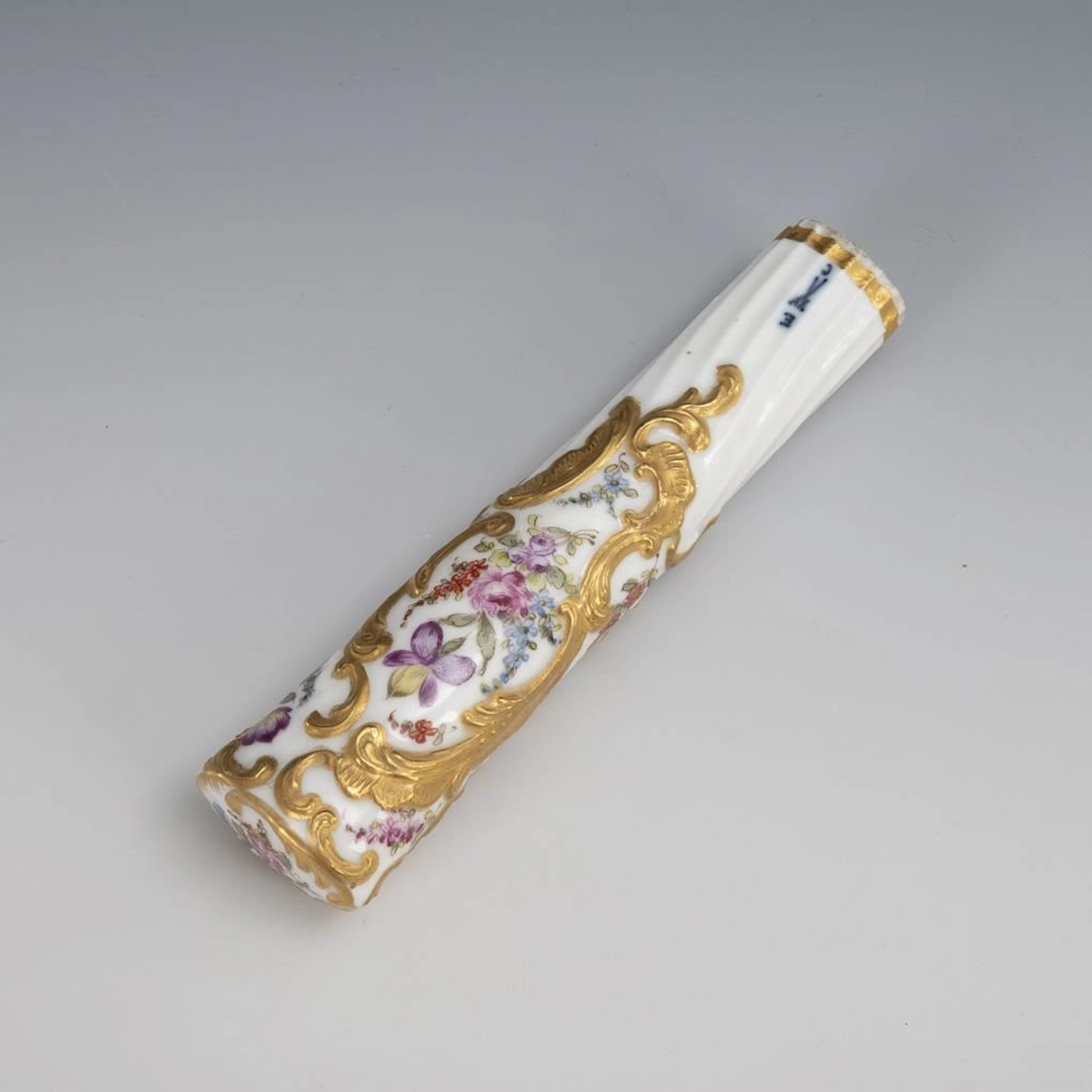 Cane handle with floral design. Bloch.
