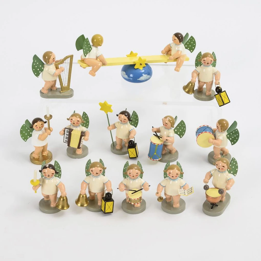 Set of 13 different angels, plus the book "100 Years of W & K". Wendt